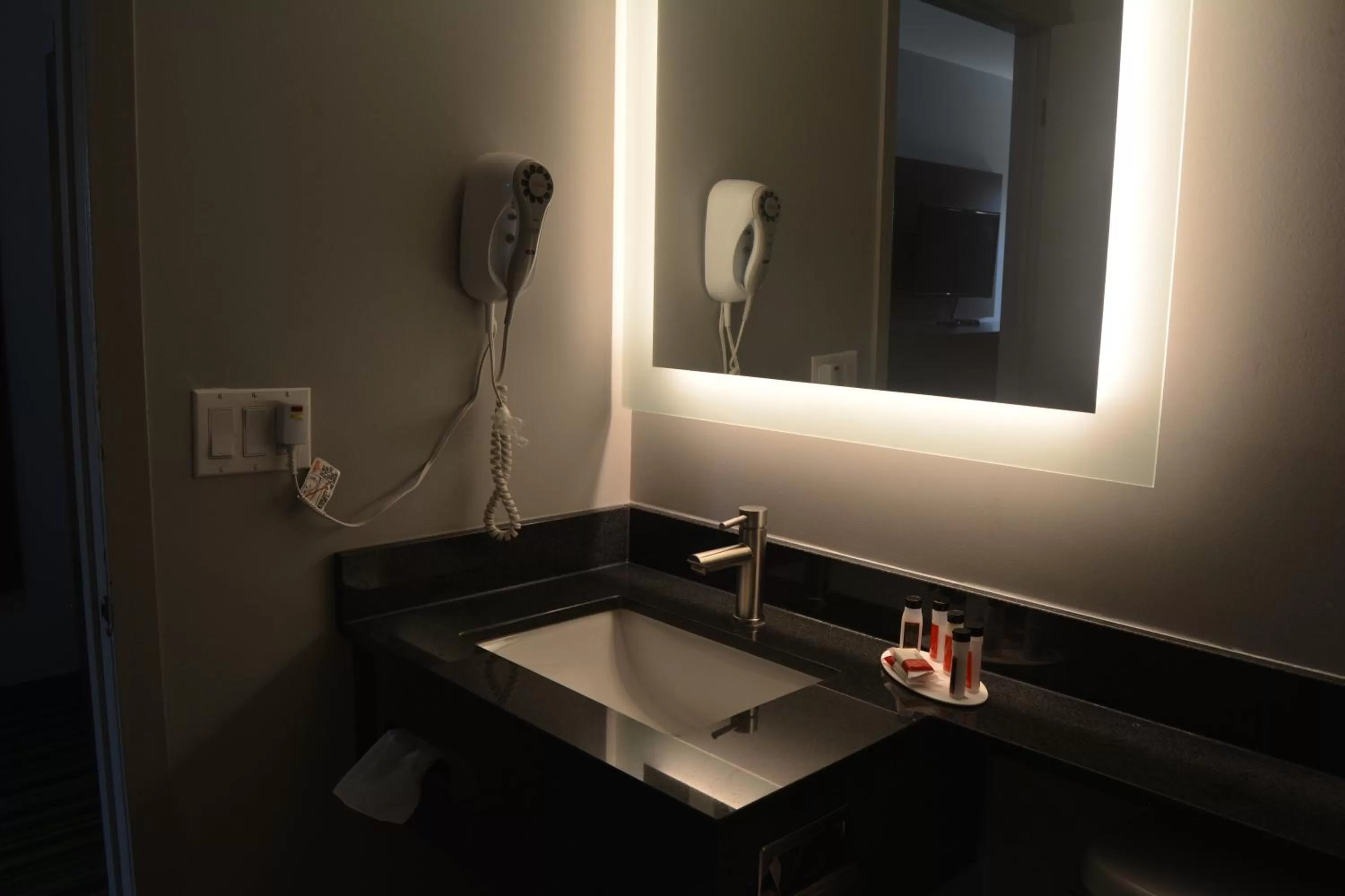 Bathroom in Super 8 by Wyndham Windsor/Dougall