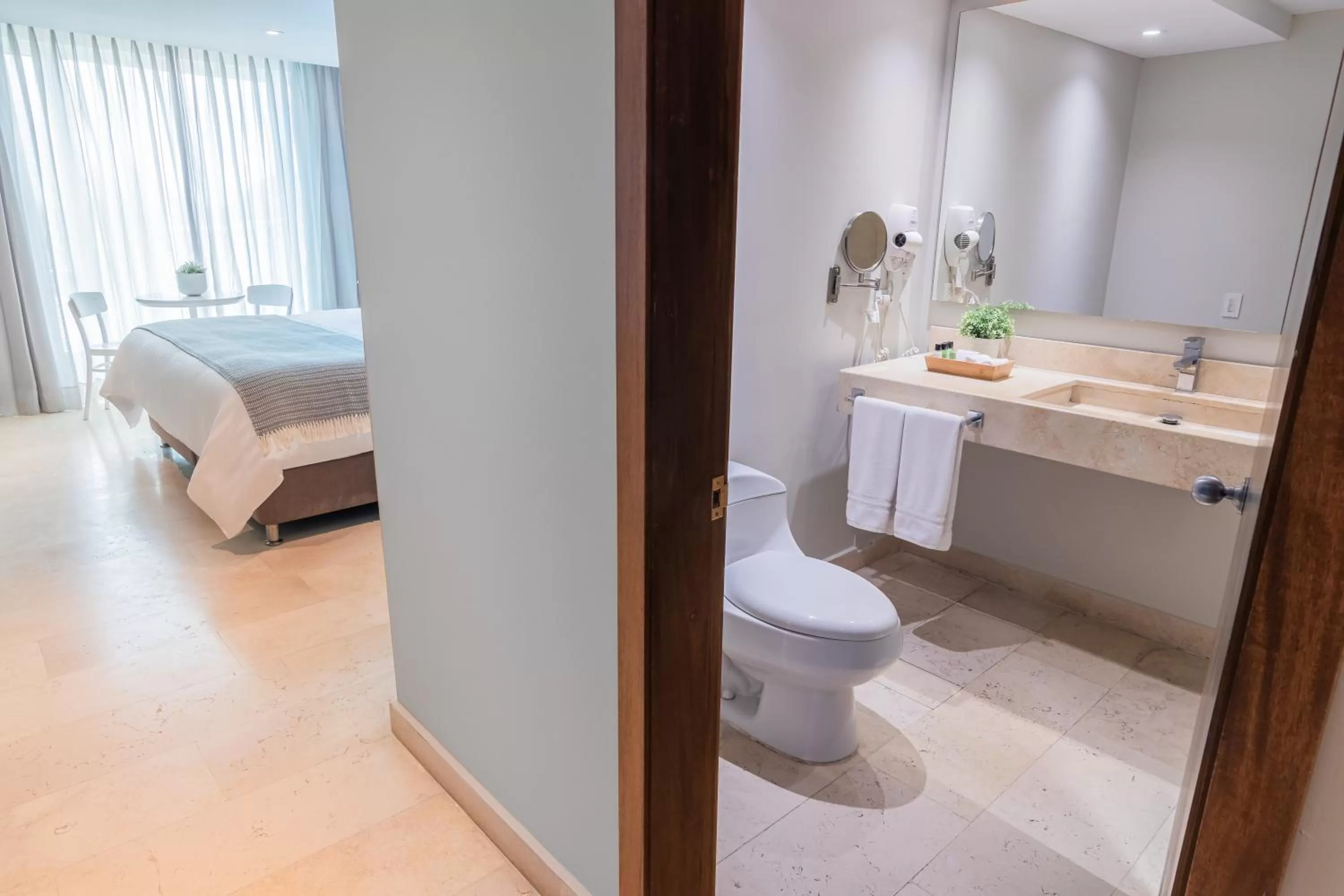 Toilet, Bed in GHL San Lazaro Art Hotel