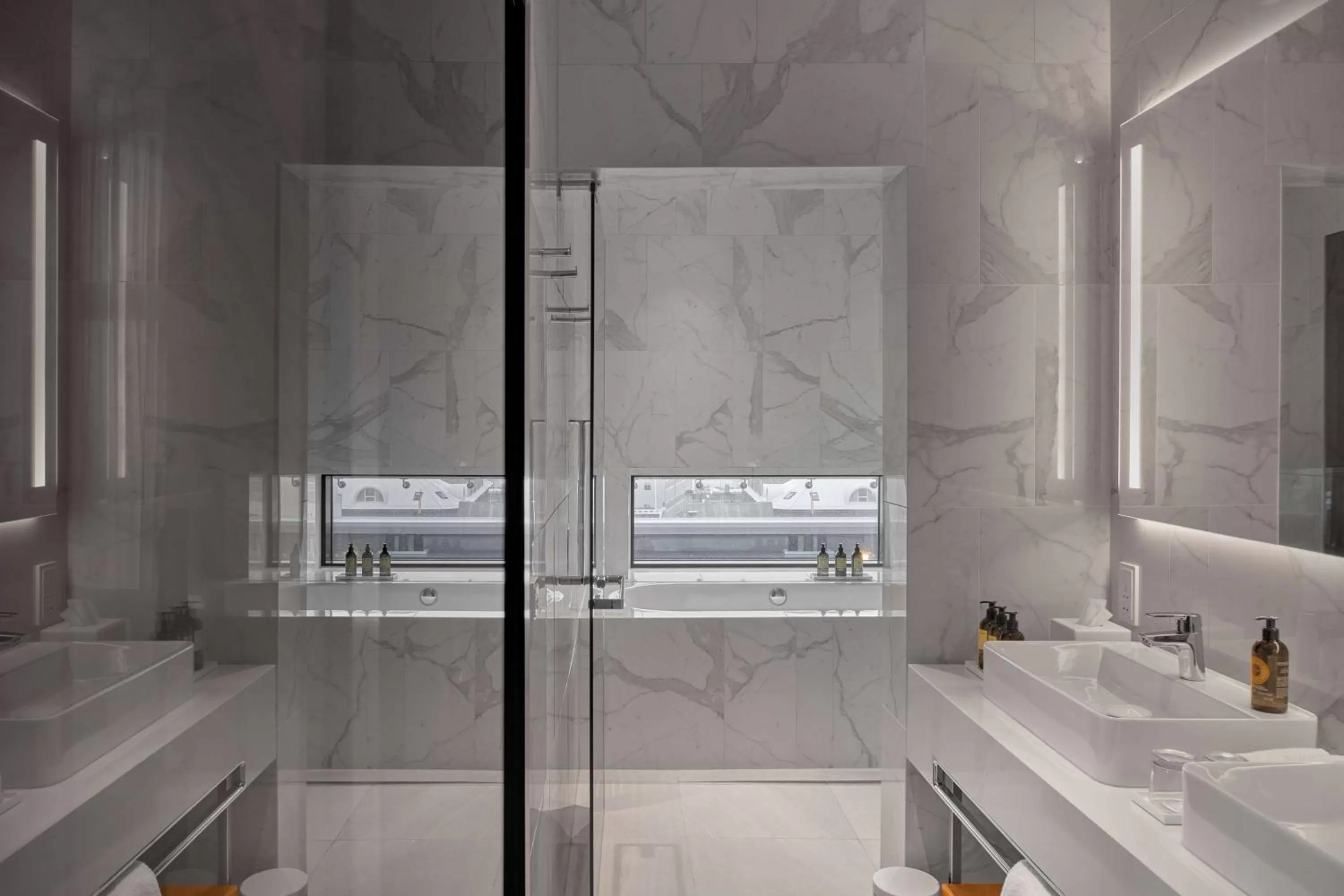 Bathroom in Iceland Parliament Hotel, Curio Collection By Hilton