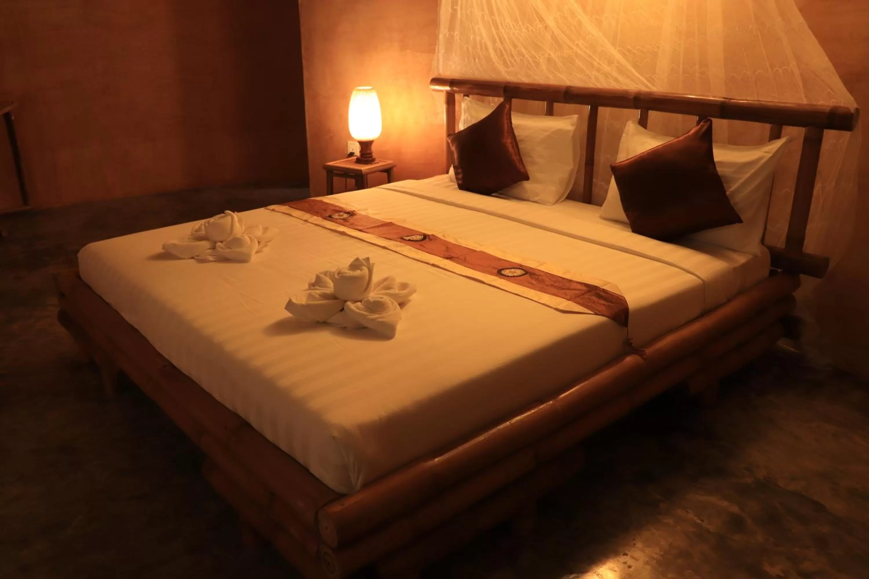 Bed in Hanchey Bamboo Resort