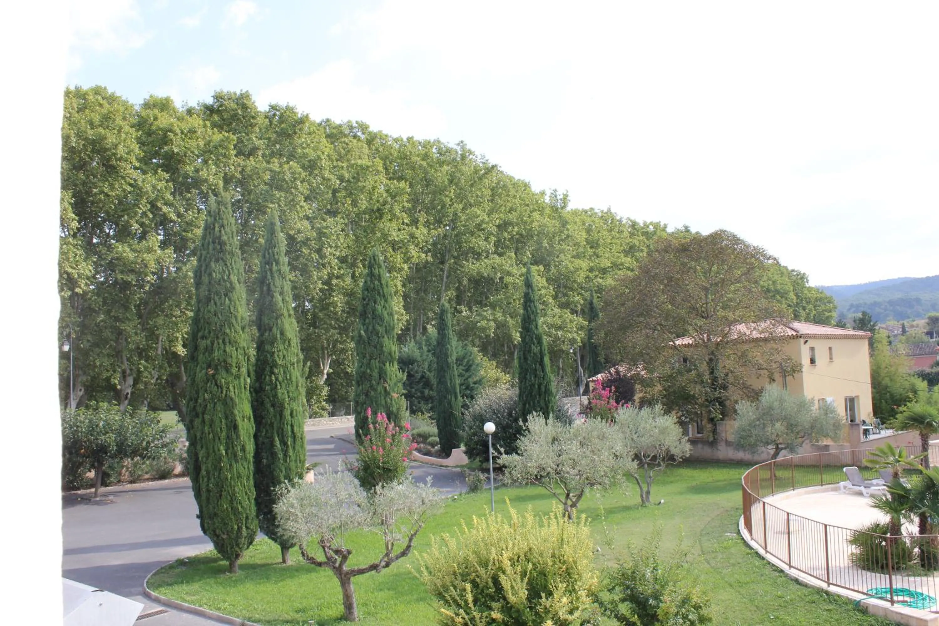 Garden in Logis Hôtel Le Mas De Jossyl