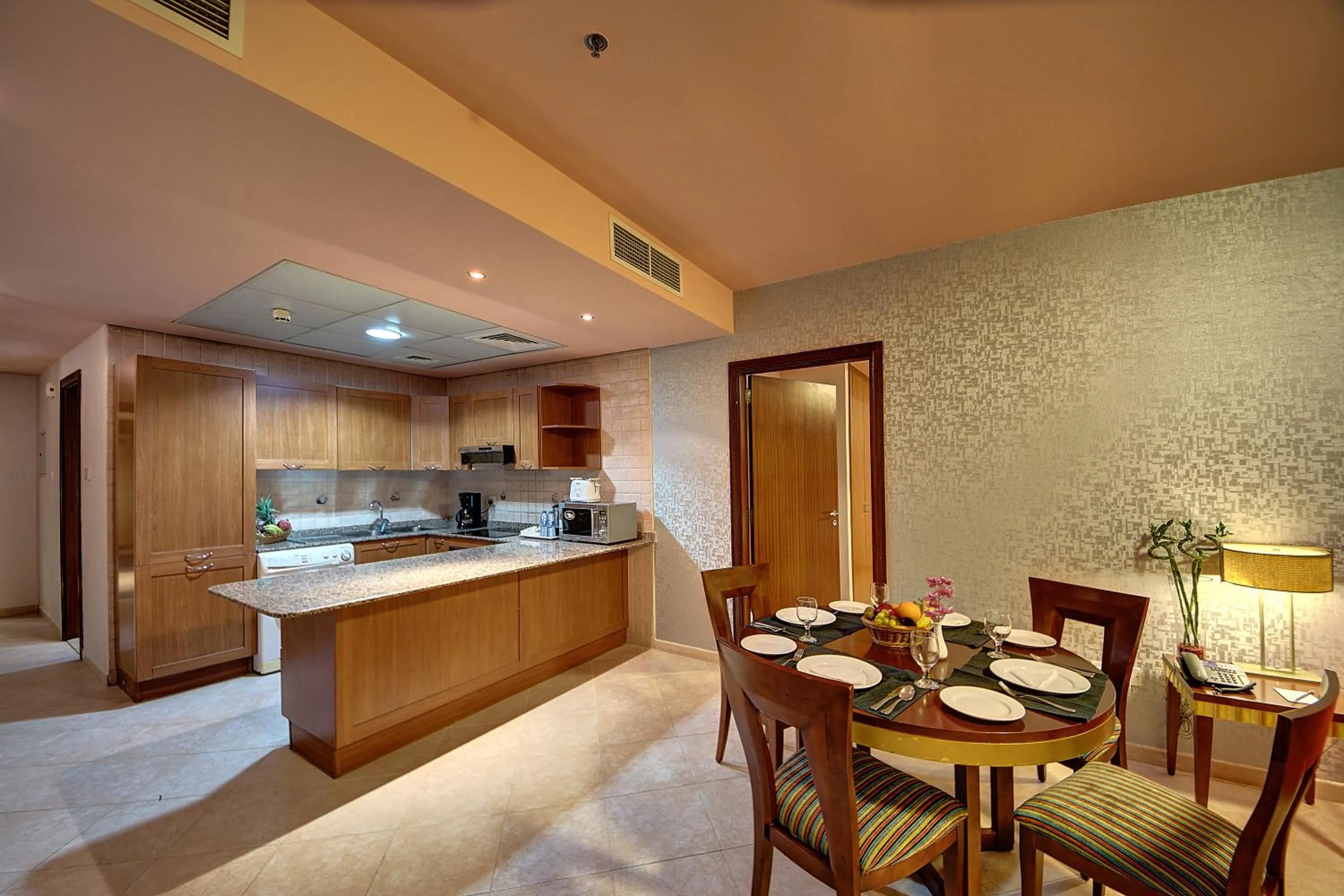 Kitchen or kitchenette in Al Manar Grand Hotel Apartment