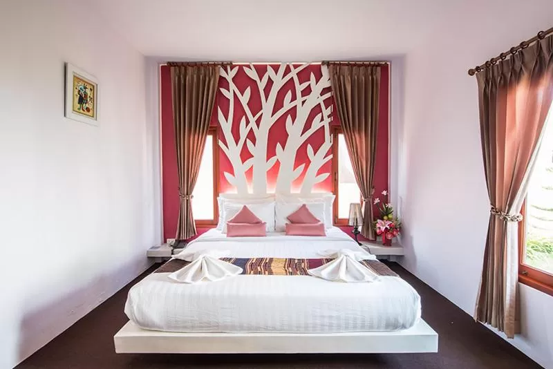 Bed in Panlaan Boutique Resort