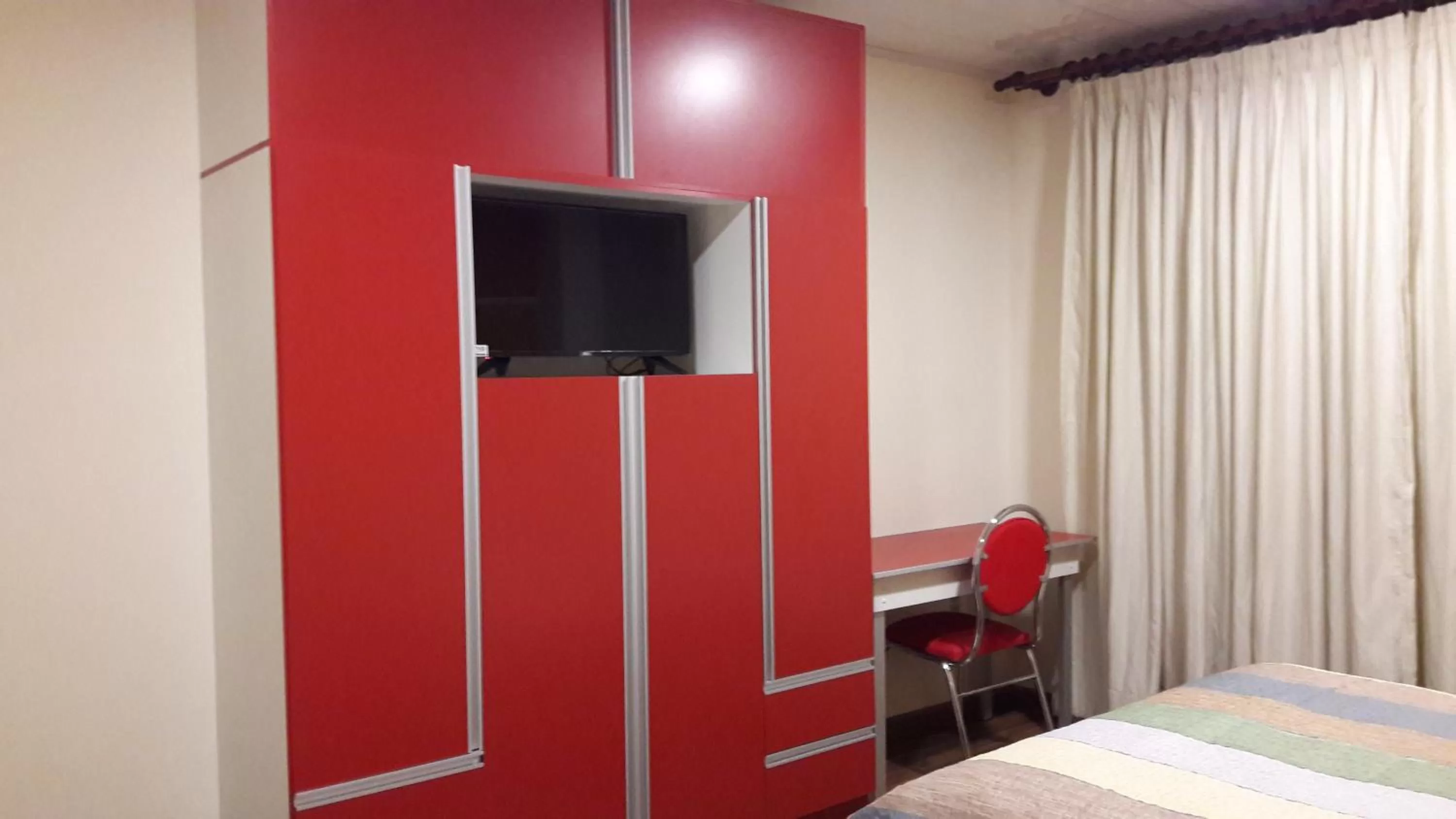 Decorative detail, TV/Entertainment Center in Apart Serma Hotel