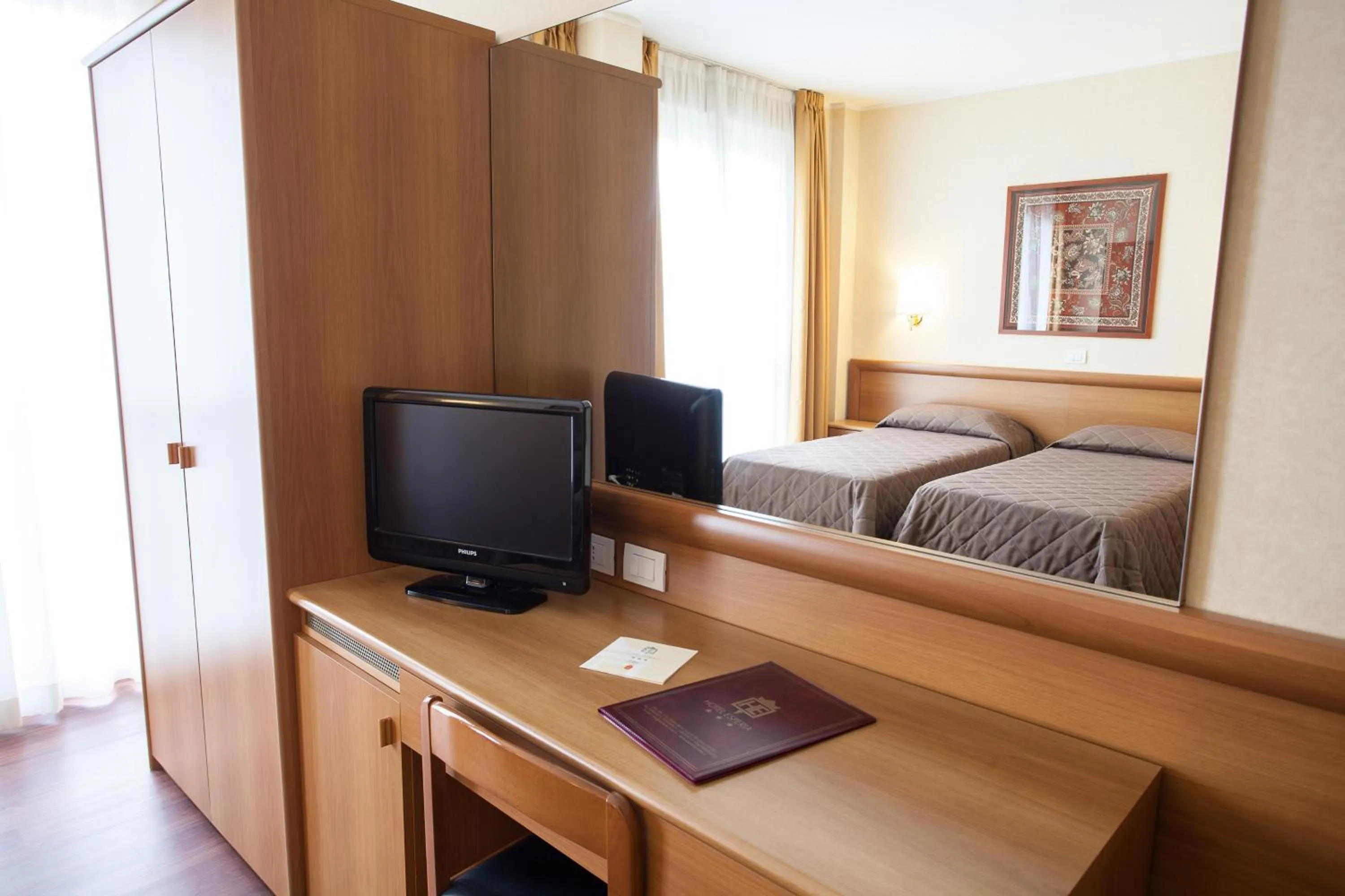 Bed in Hotel Esperia