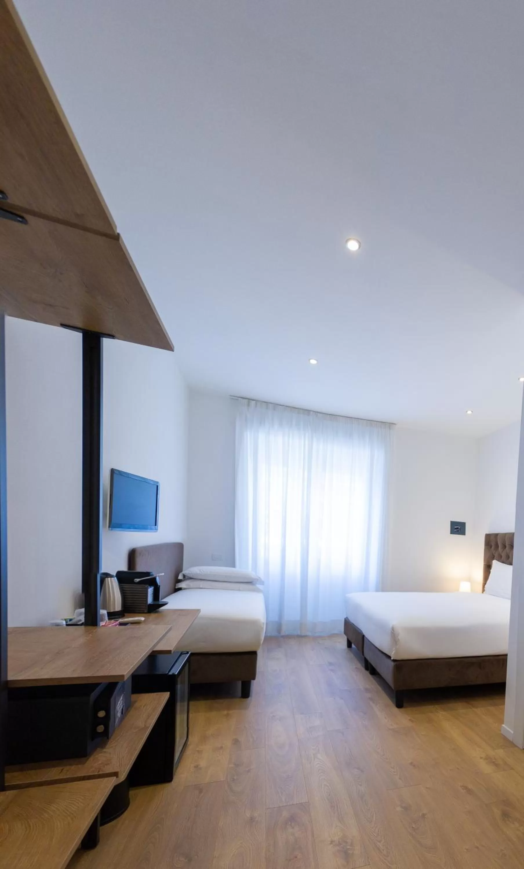 Bed in Michelangelo Vatican Rooms