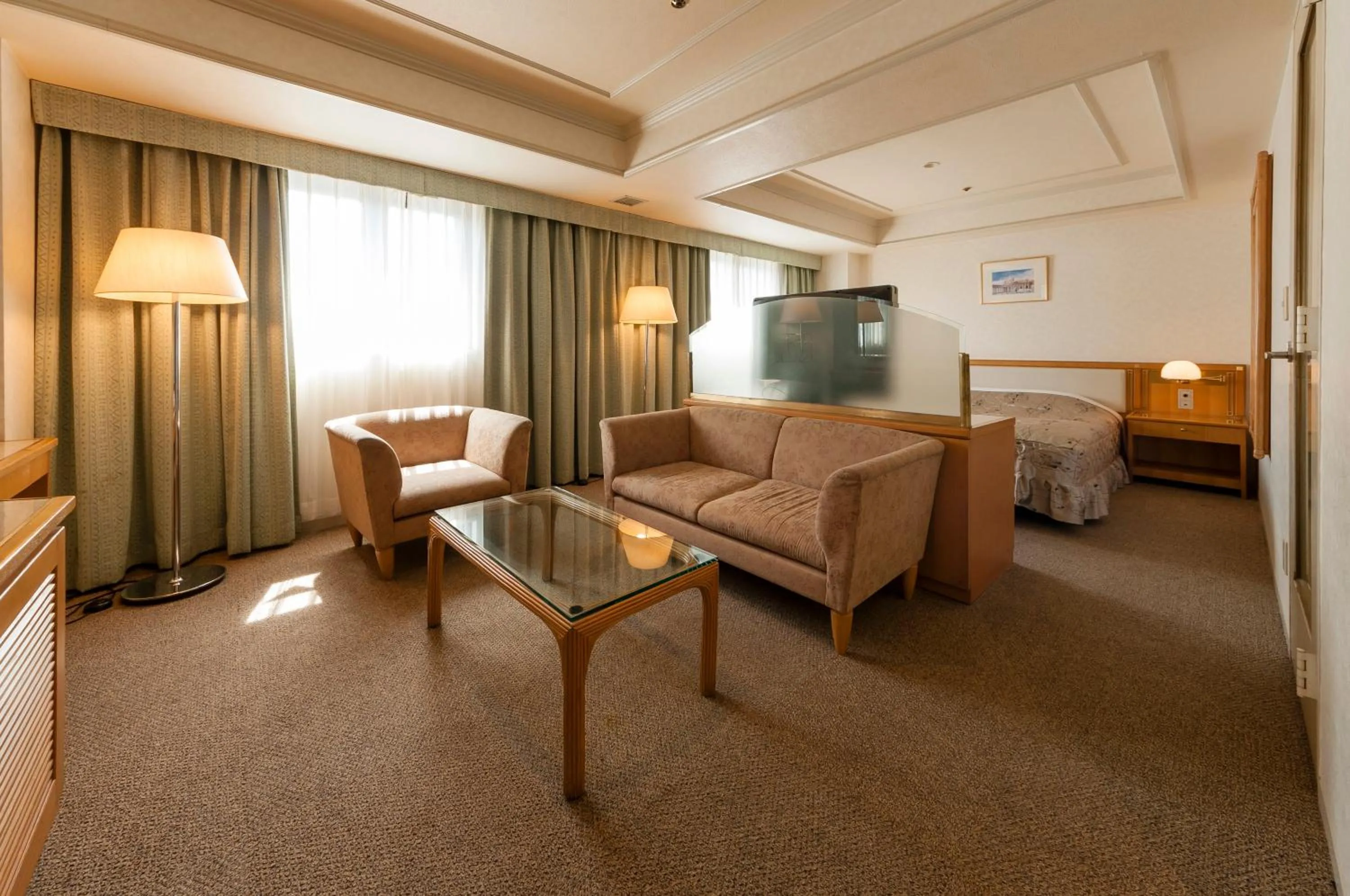 Living room, Bed in Hotel Siena