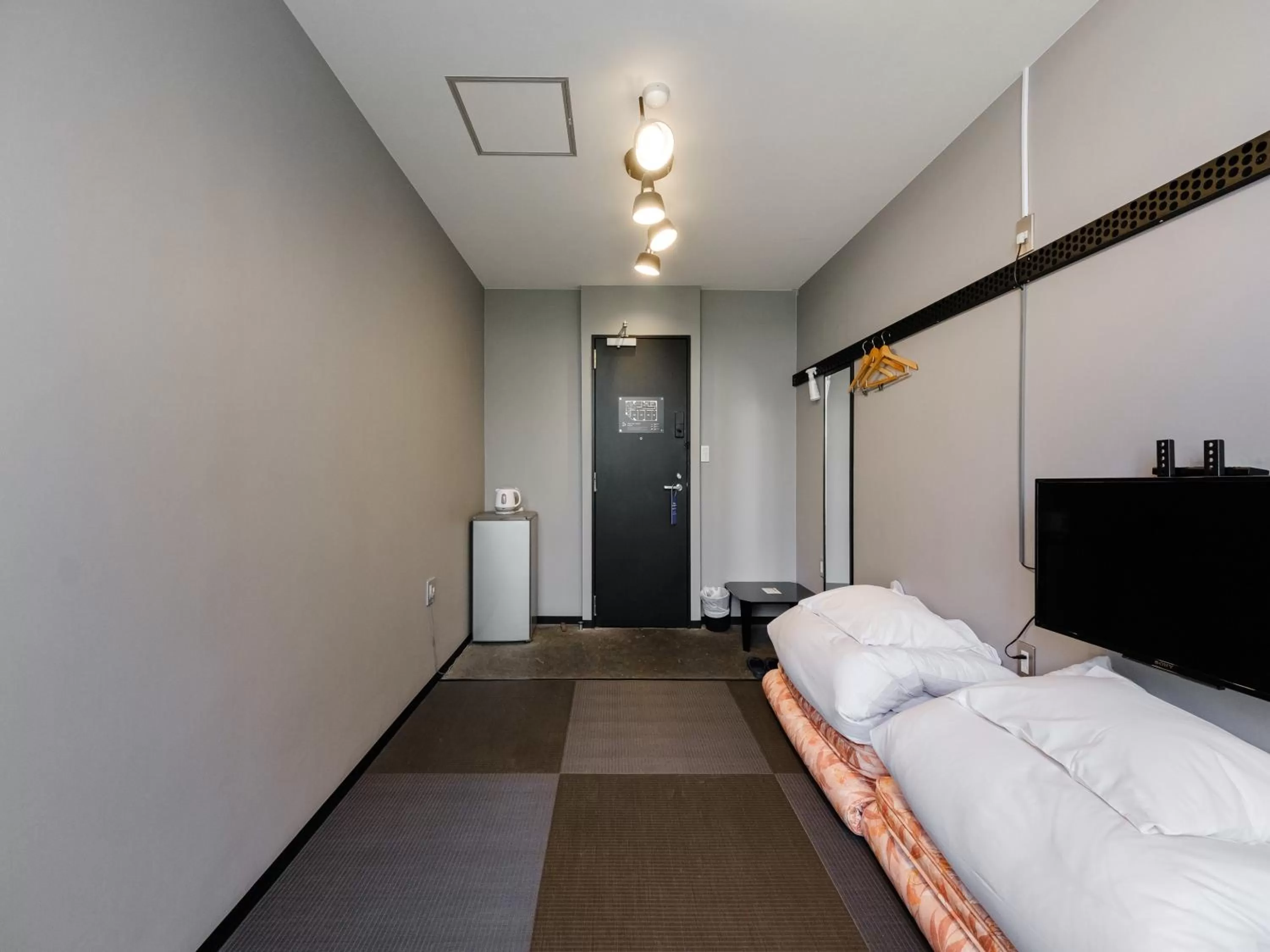 Bed in Tabist THE GREEN ASAHIKAWA