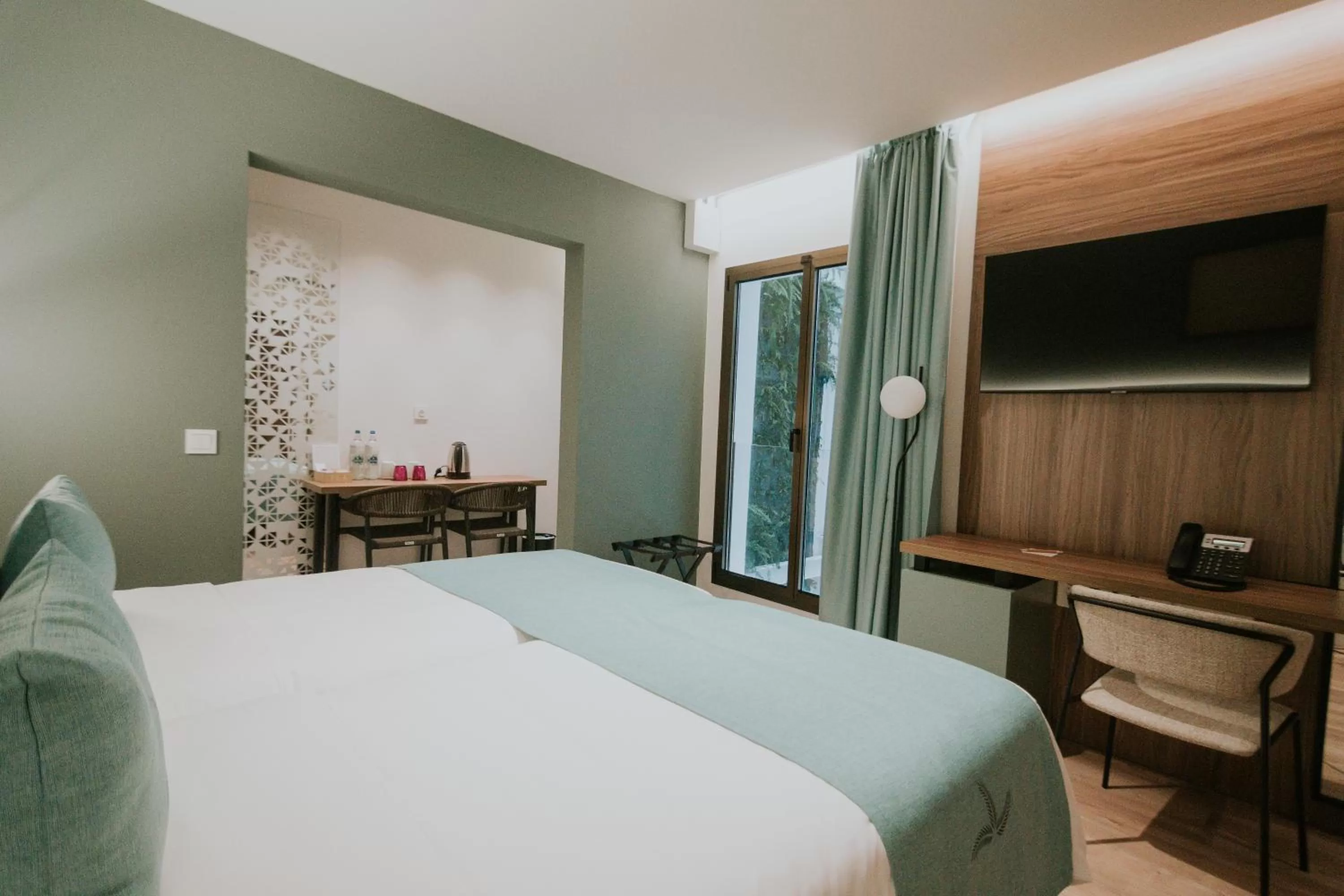 Bed in Catalina Plaza Hotel Sostenible