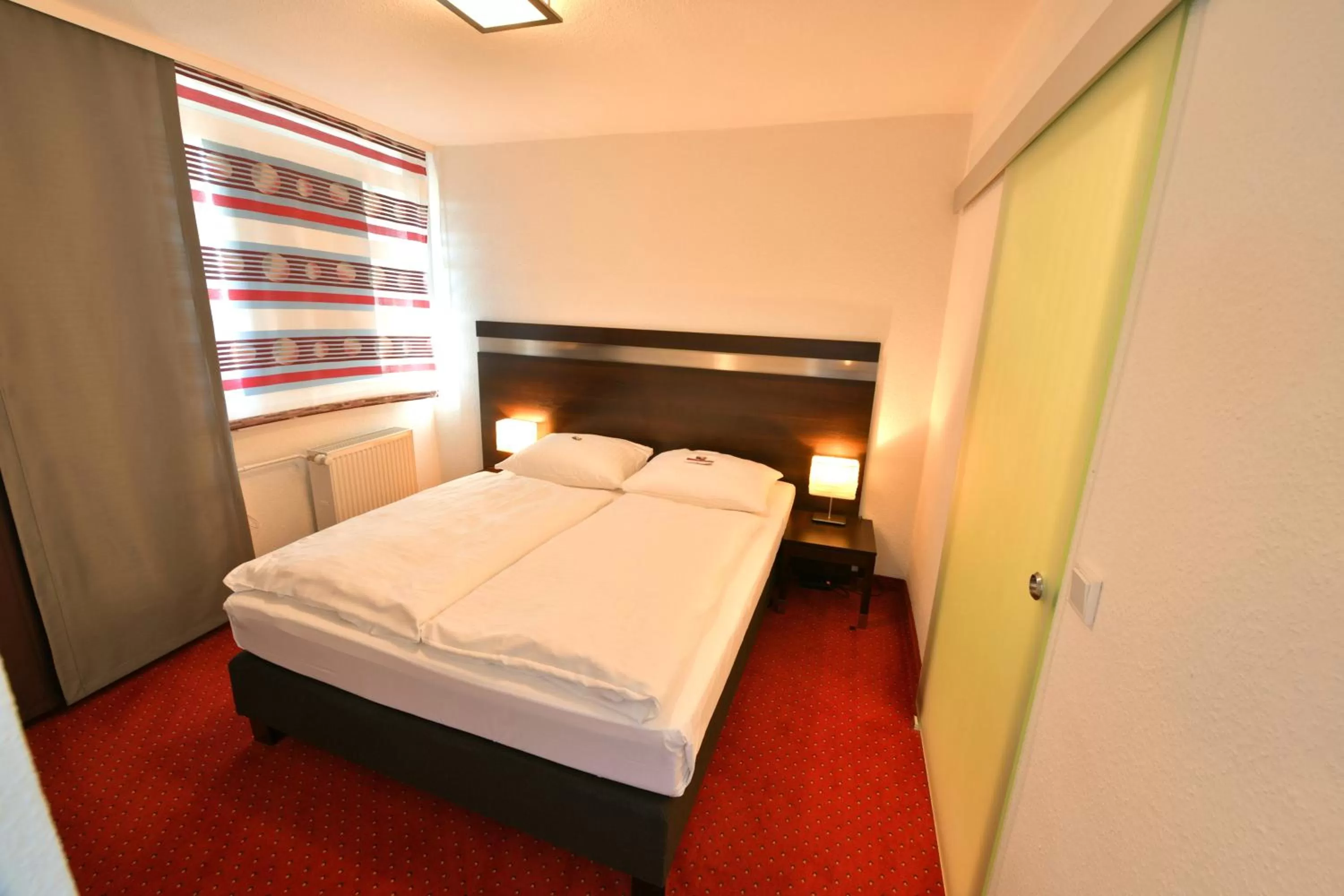 Bed in SKYHOTEL Merseburg