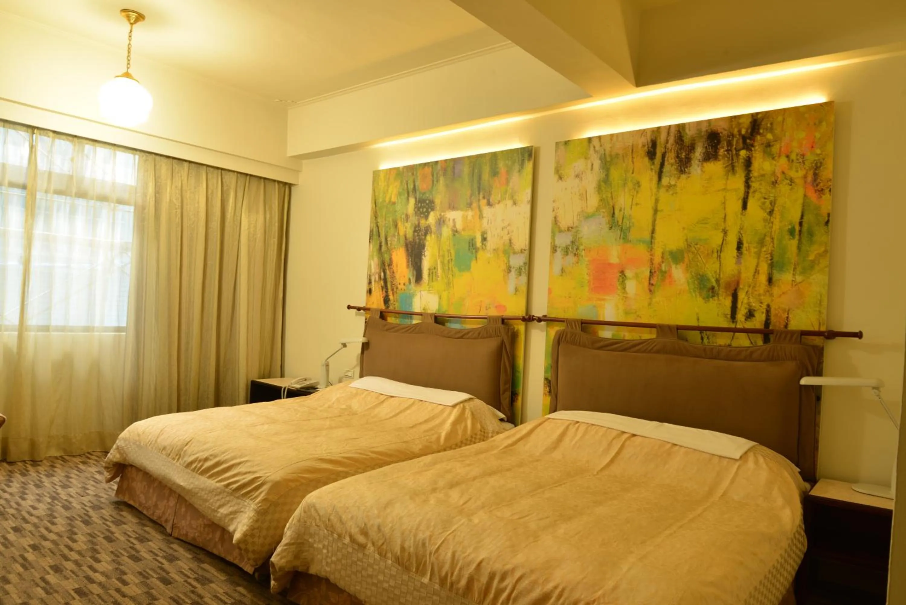 Bed in Kingship Hotel Kaohsiung Inter Continental