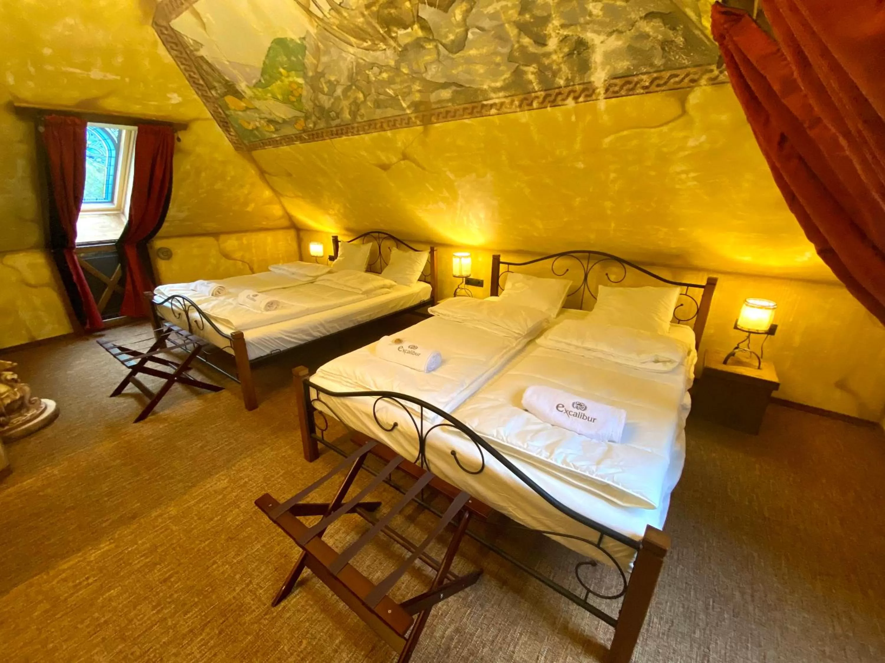 Bed in Excalibur miniHotel