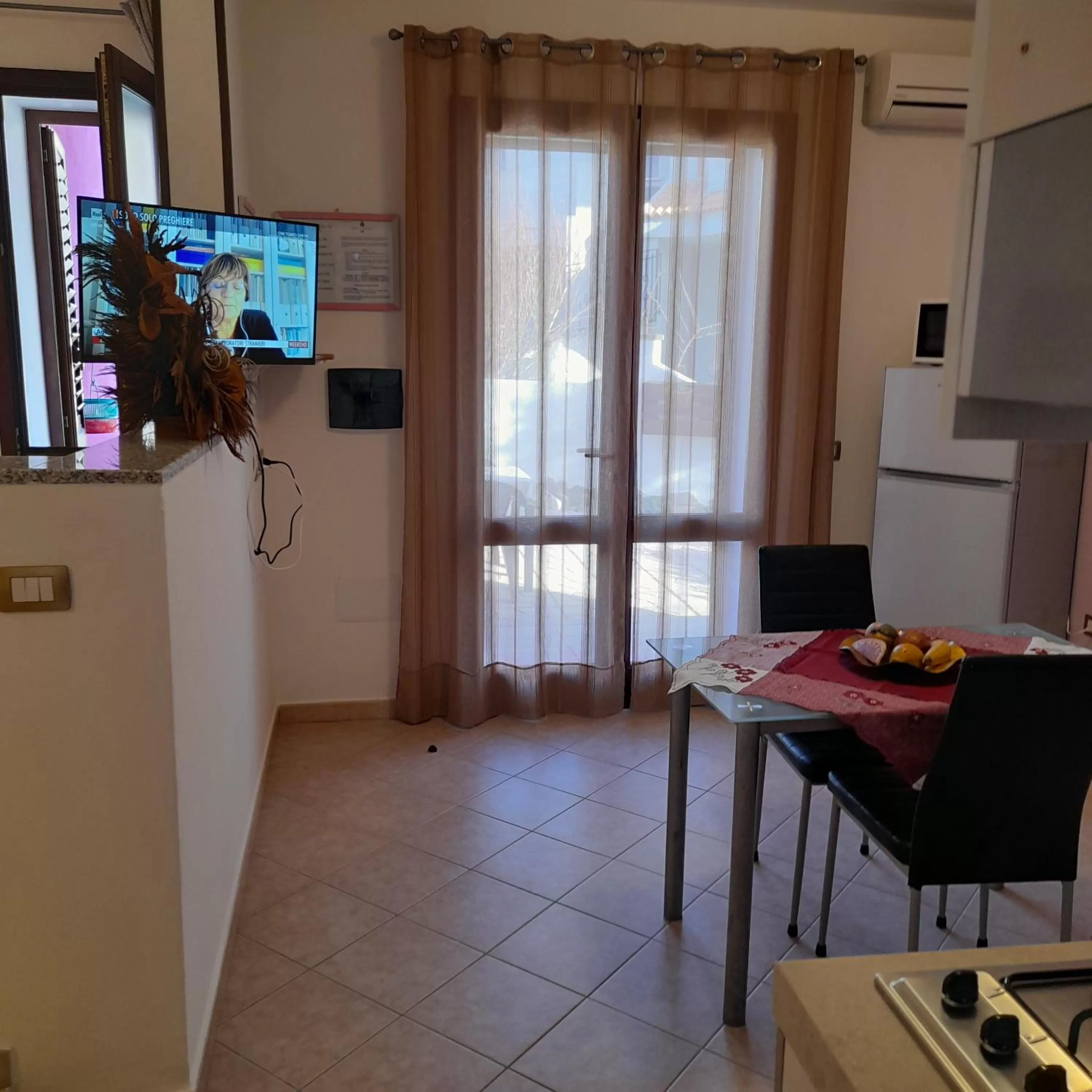 TV and multimedia in La Fortezza casa vacanze & appartament