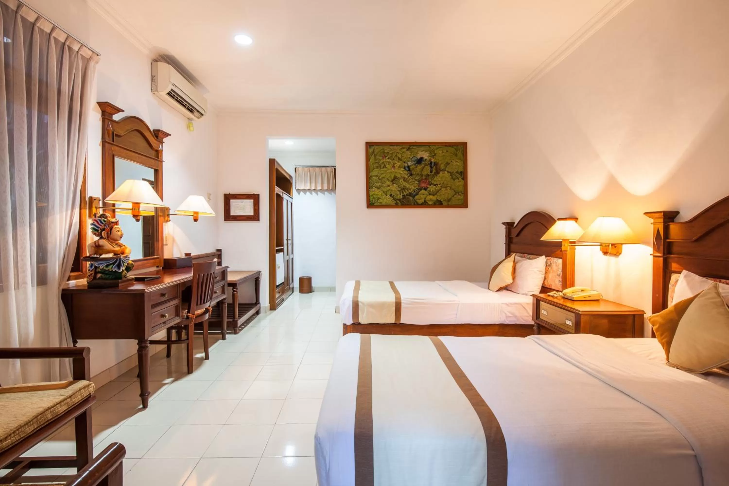 Bed in Vila Shanti Beach Front Hotel Sanur