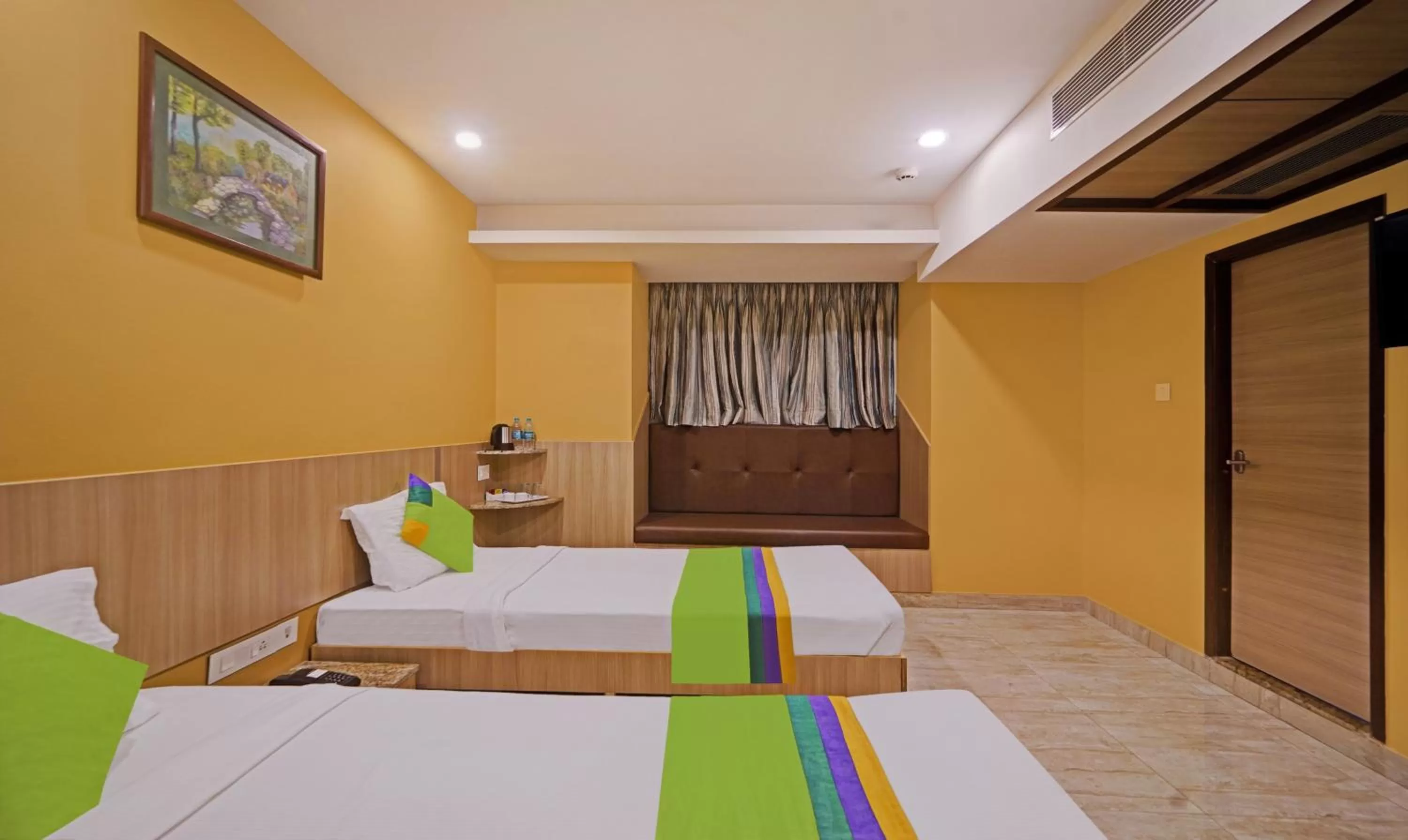 Bedroom, Bed in Treebo Fourth Avenue