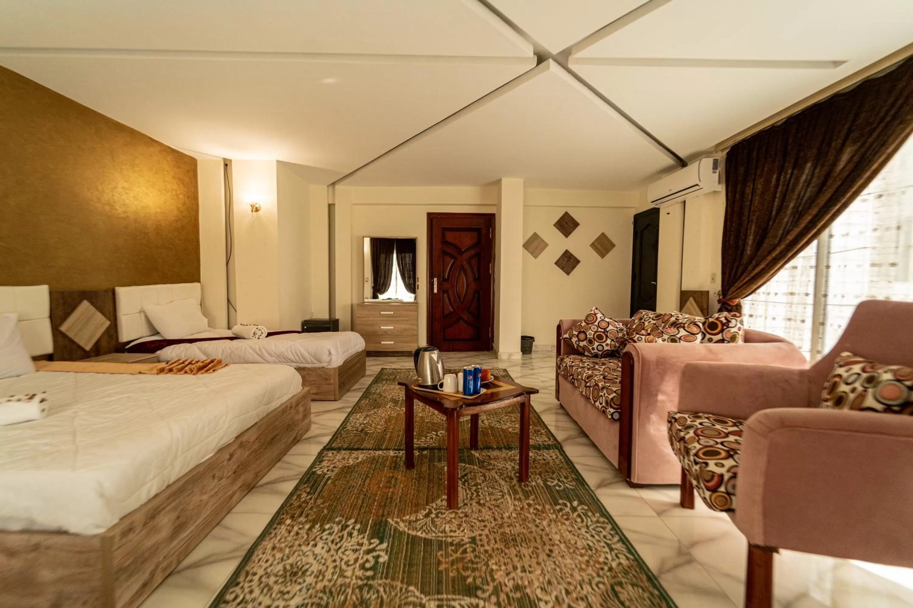 Photo of the whole room, Bed in Gardenia Inn Hotel