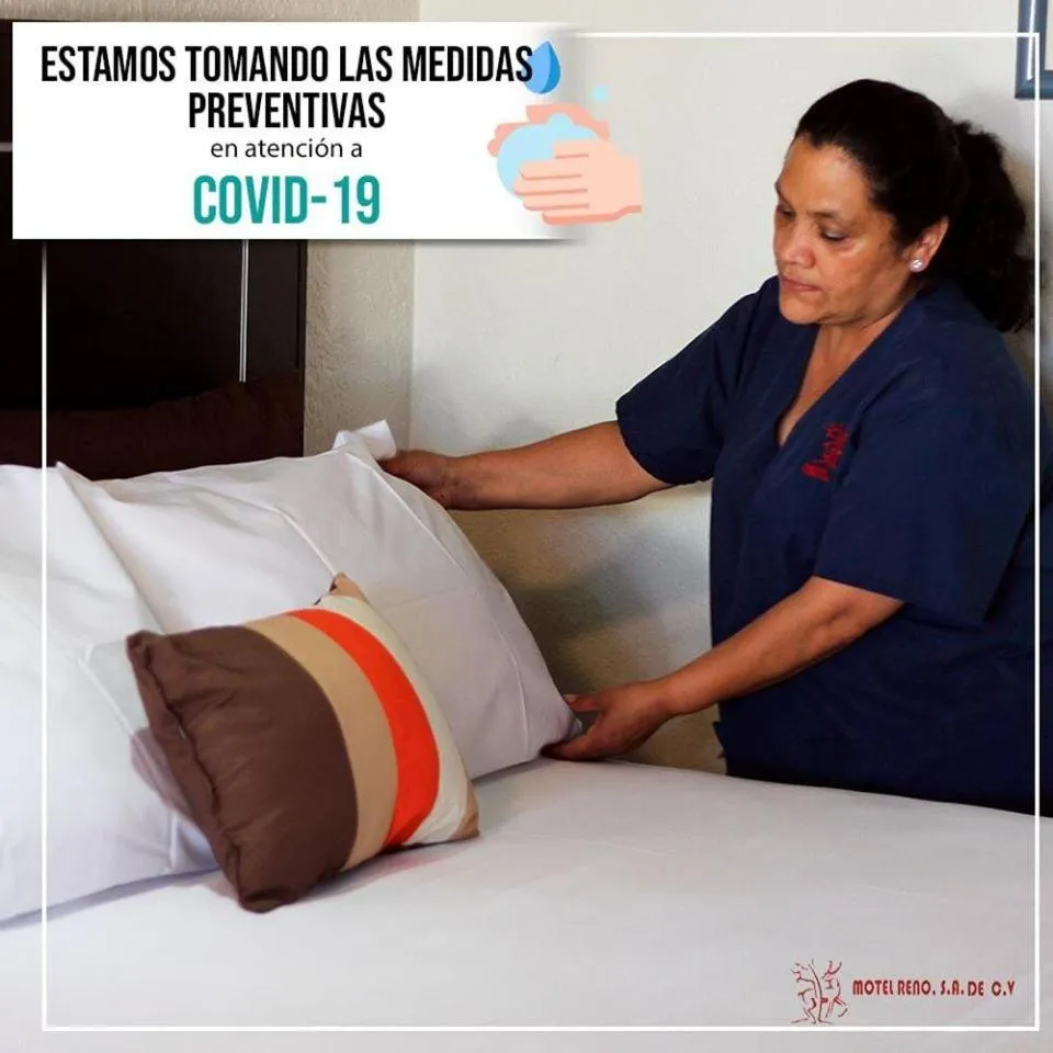 Staff, Bed in Motel Reno