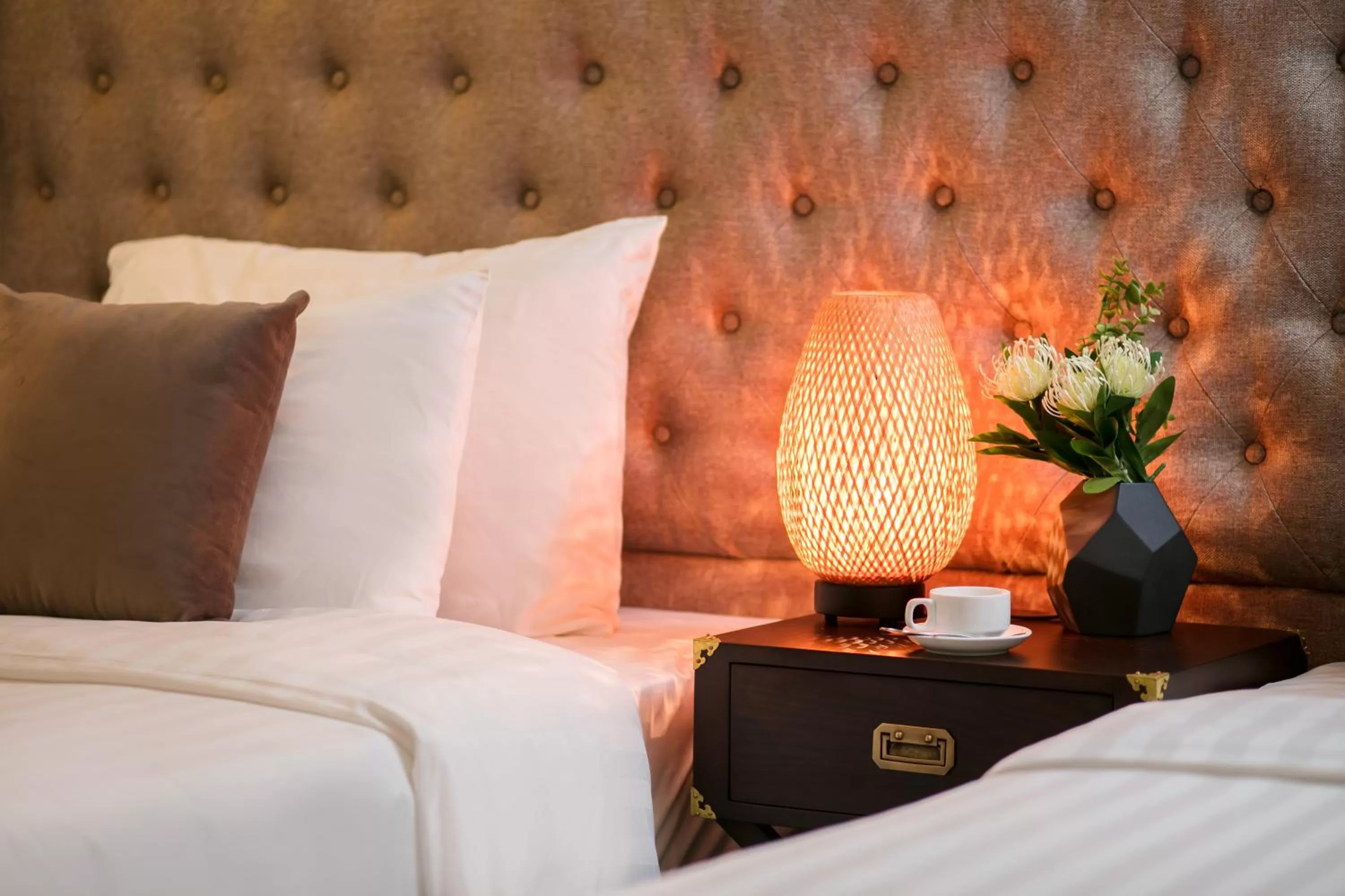 Decorative detail, Bed in Golden Rooster Hotel