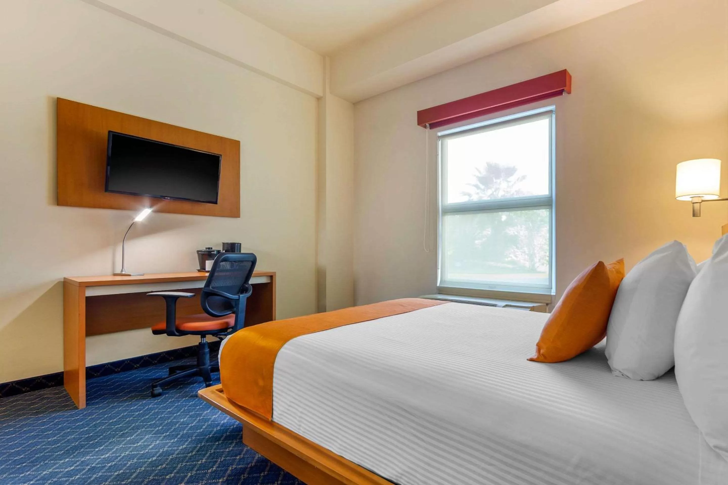 Photo of the whole room, Bed in Greenwood Hotel Torreón