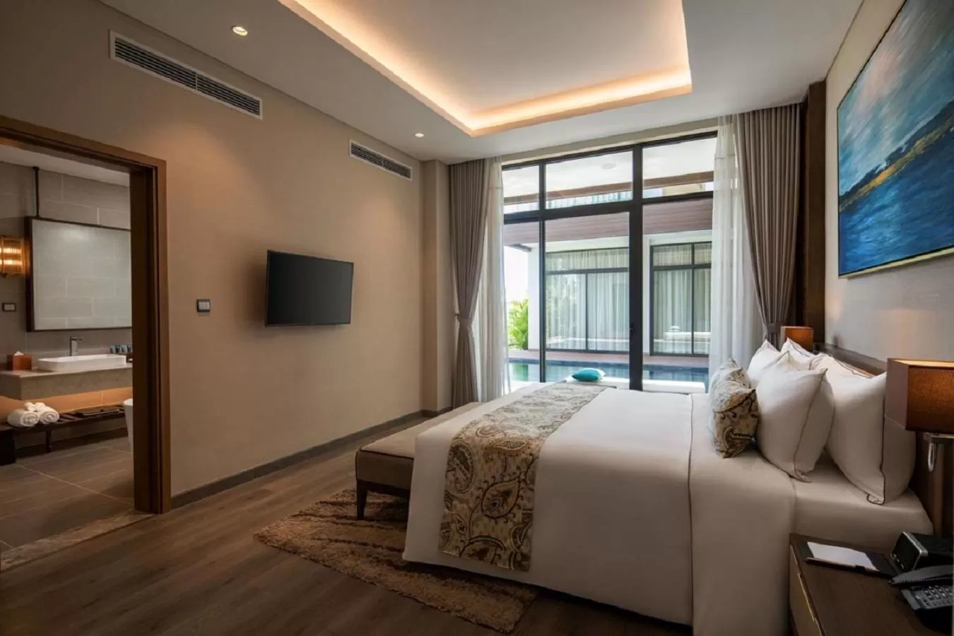 Communal lounge/ TV room, Bed in Wyndham Grand KN Paradise Cam Ranh