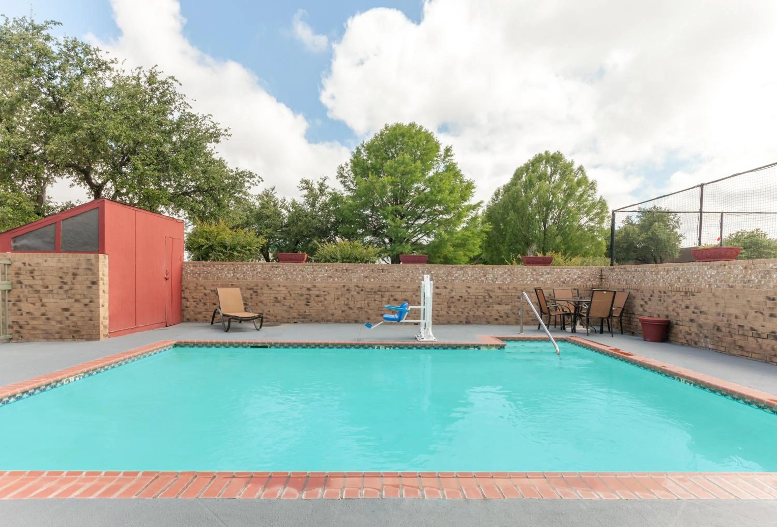 Swimming pool in Hawthorn Extended Stay by Wyndham Richardson