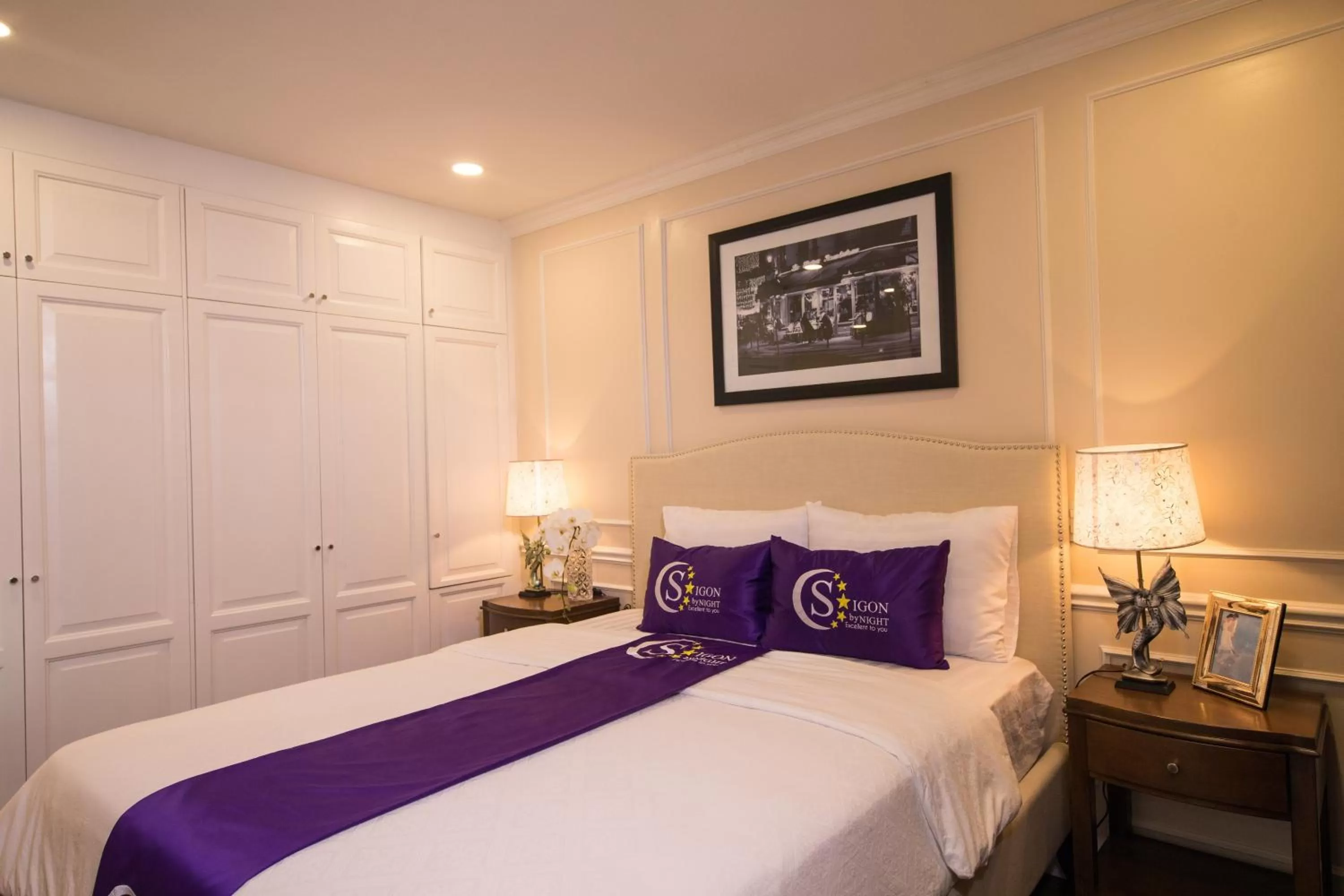 Bed in Saigon By Night Luxury Hotel