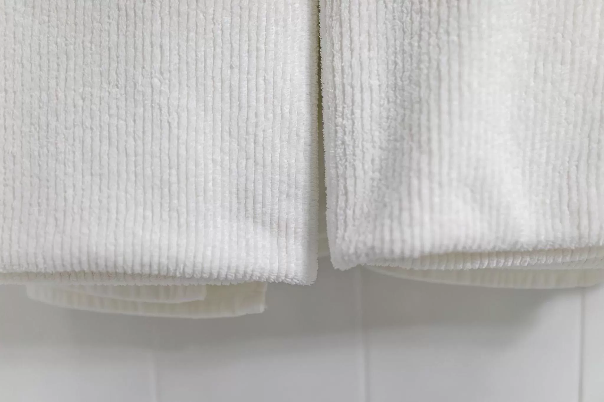 towels, Bed in Charbonnier Motor Inn