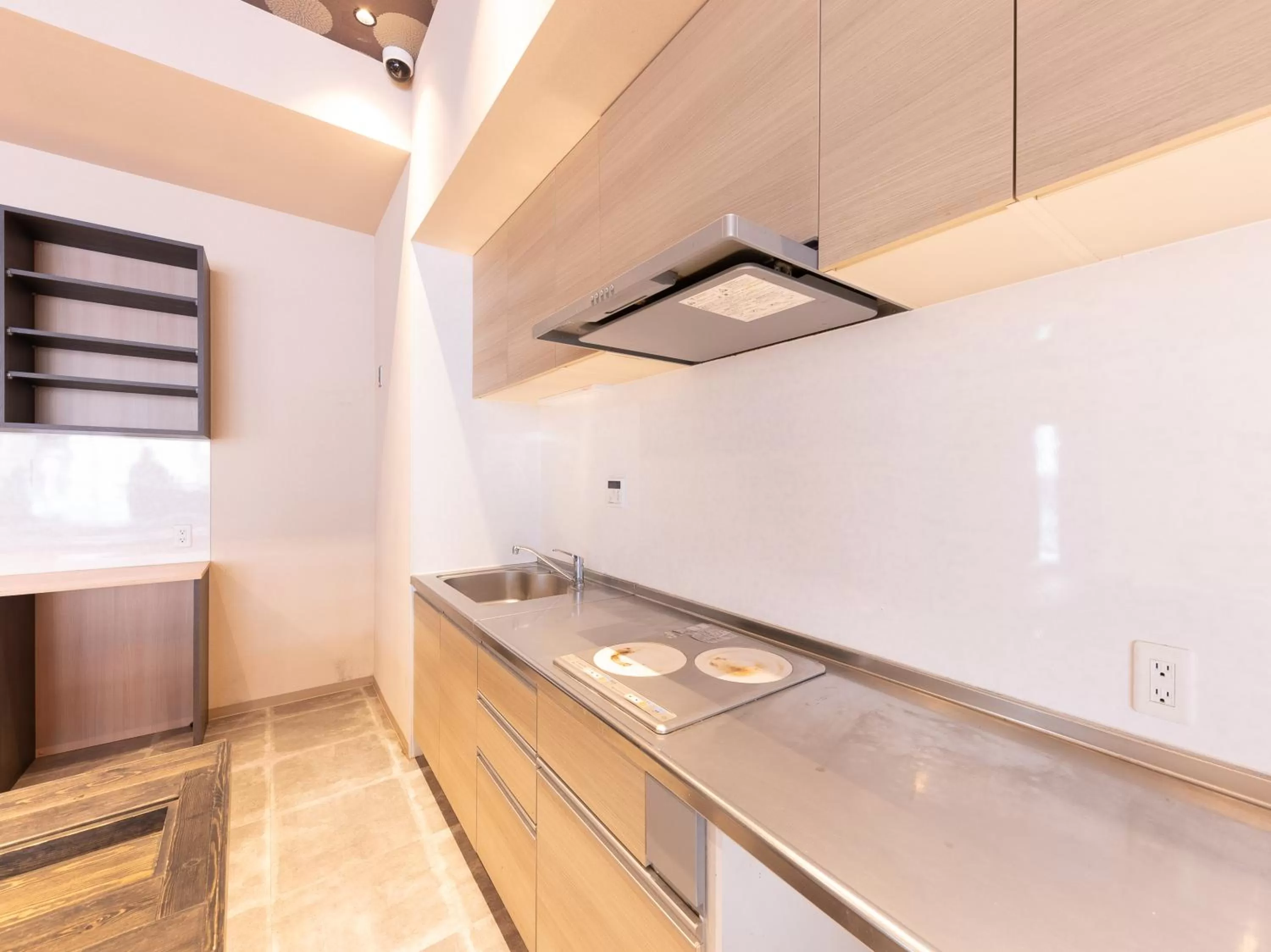 Communal kitchen in Hiromas Hotel Kura