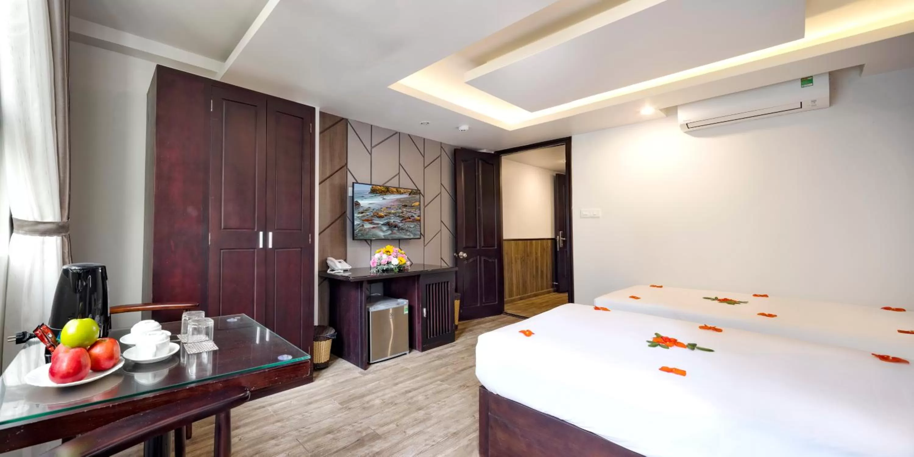 Bed in Azura Gold Hotel & Apartment