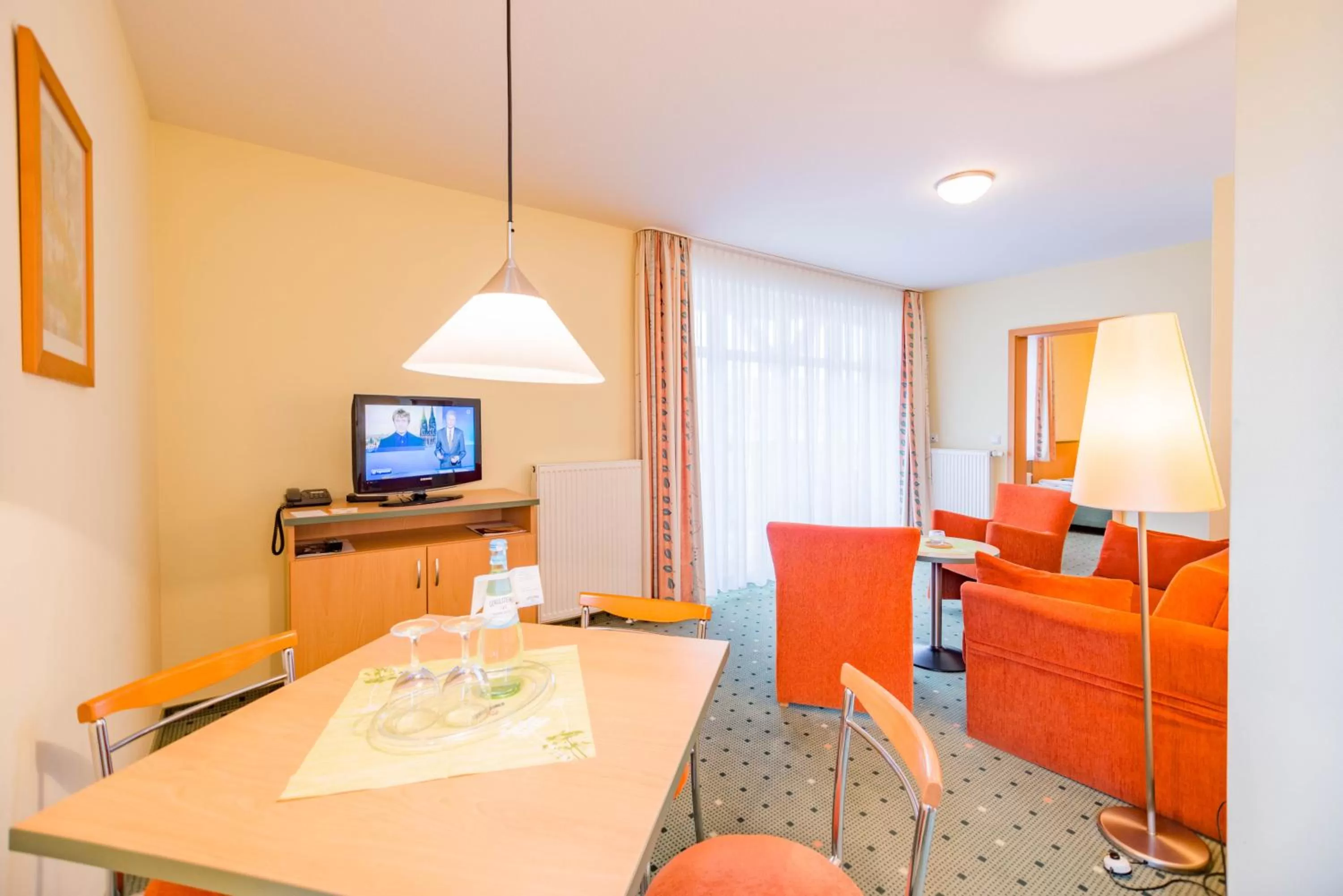 Photo of the whole room, TV/Entertainment Center in Am Weststrand Apartmenthaus Waldeck