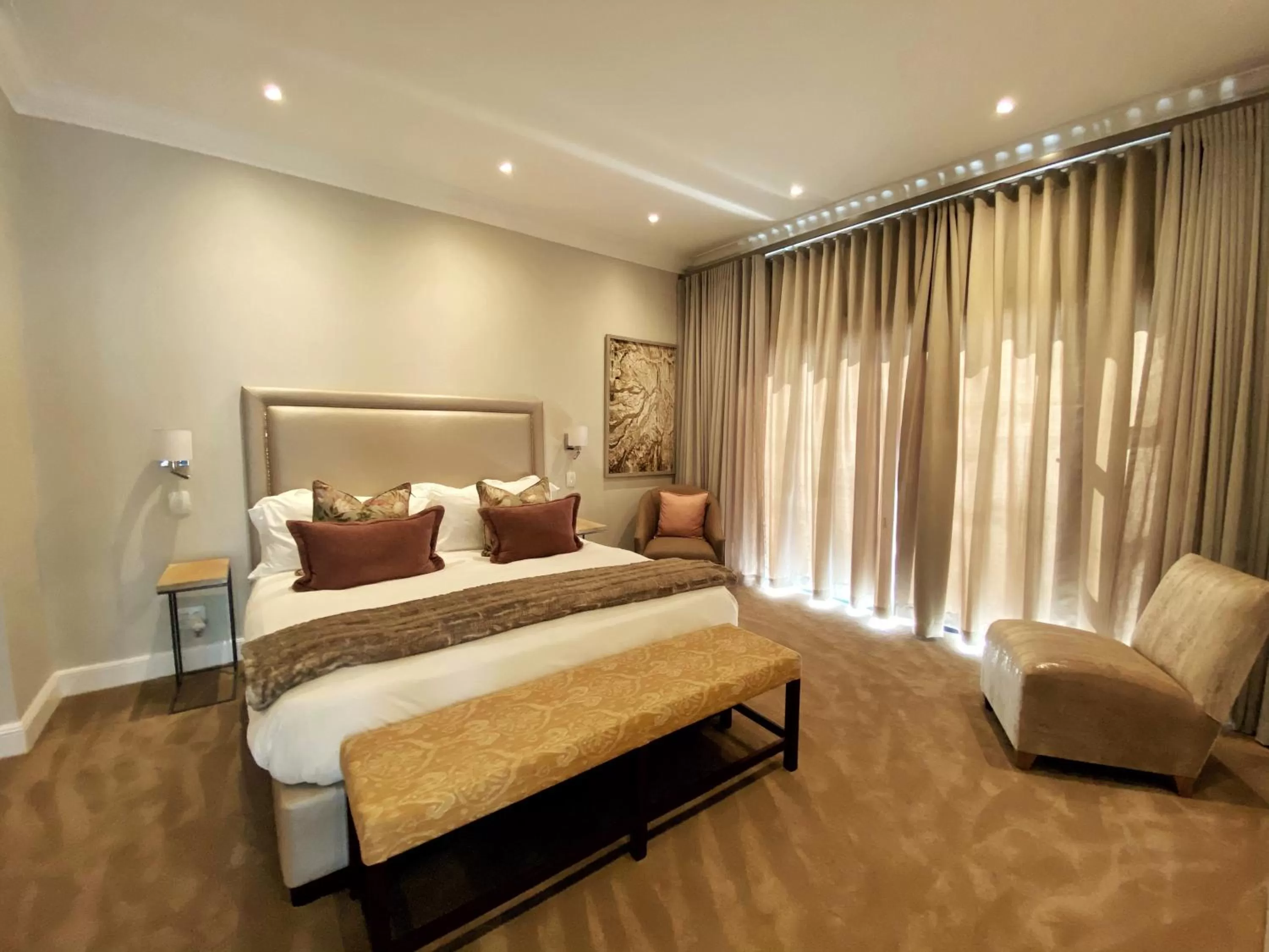 Bed in The Northcliff Boutique Hotel