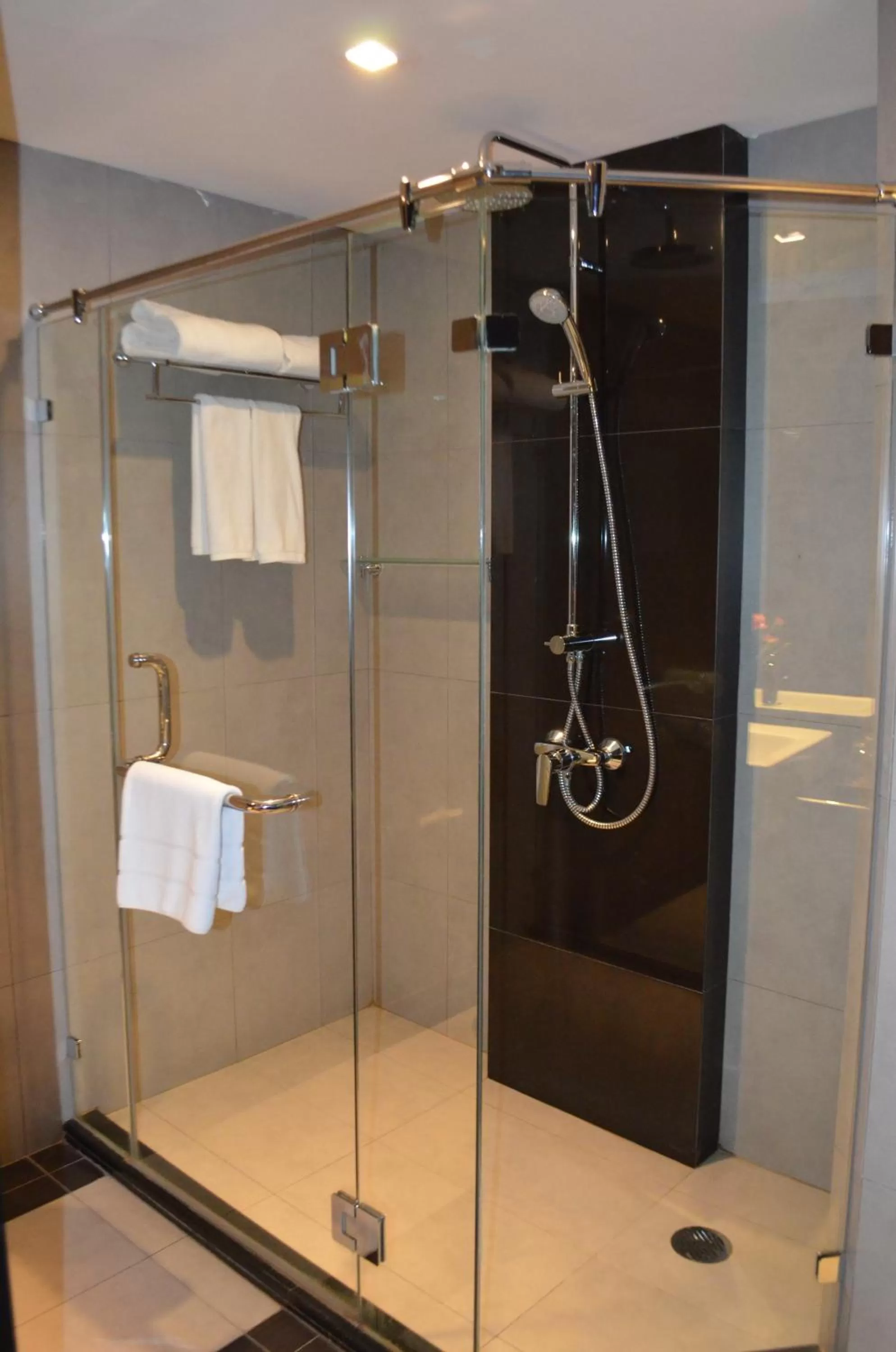 Bathroom in Golden Tulip Mandison Suites