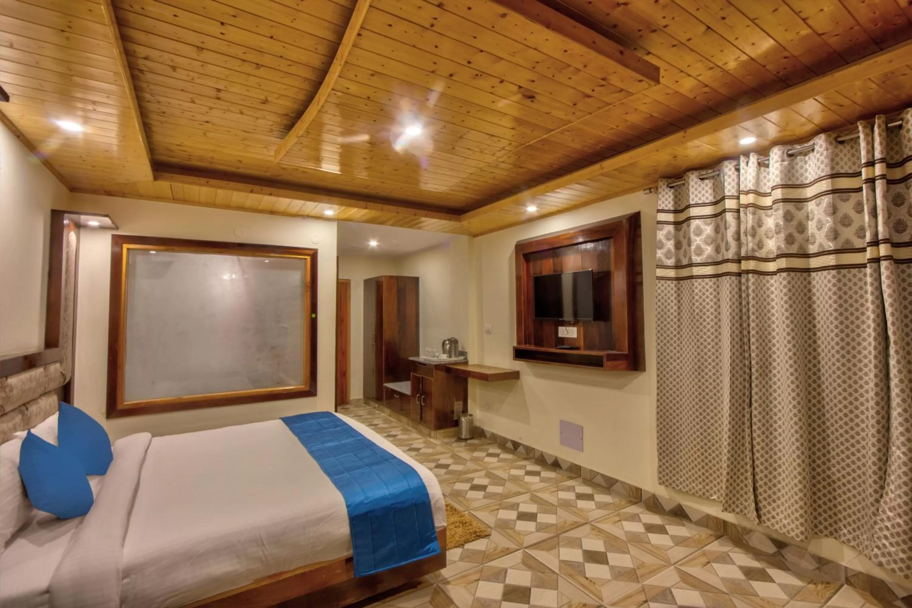 TV and multimedia, Bed in Snow City's Montana Blues Resort Manali - Heated & Air-Cooled Stay
