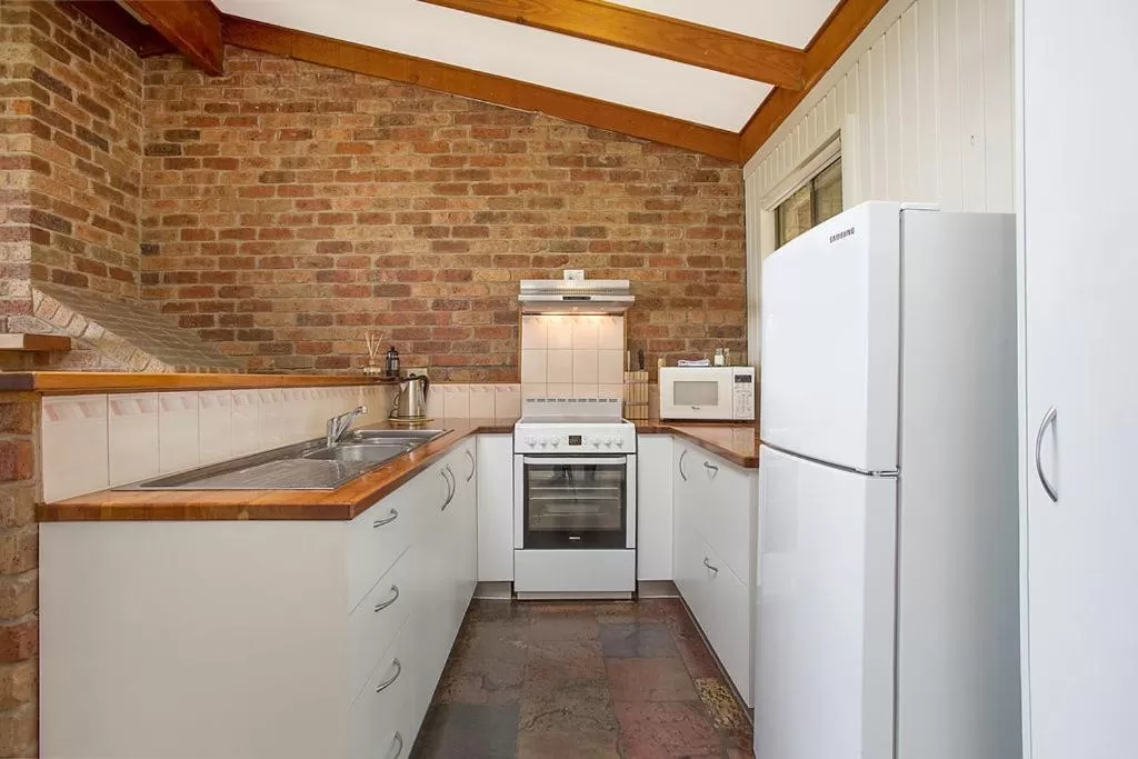 Kitchen or kitchenette in Beacon Point Ocean View Villas