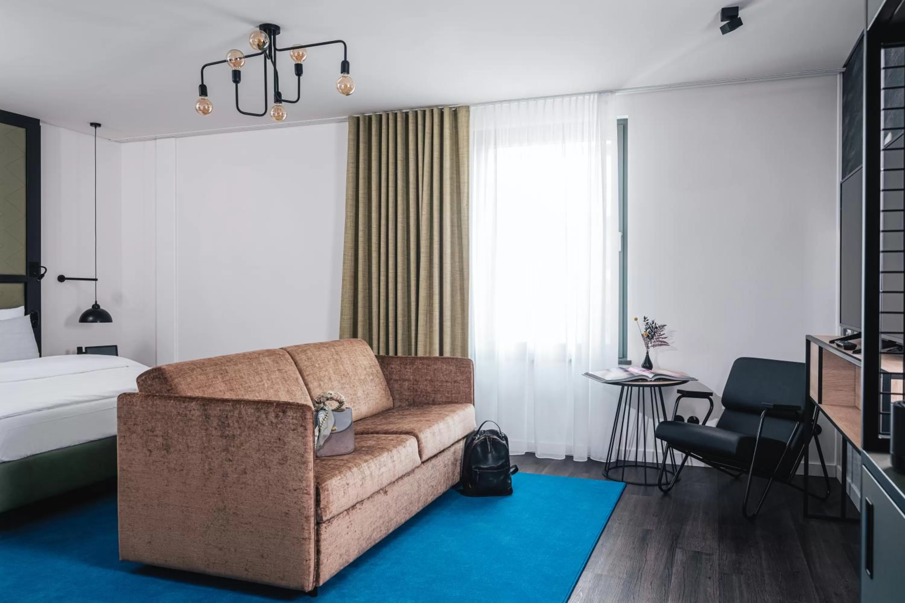 Seating area in AMERON München Motorworld