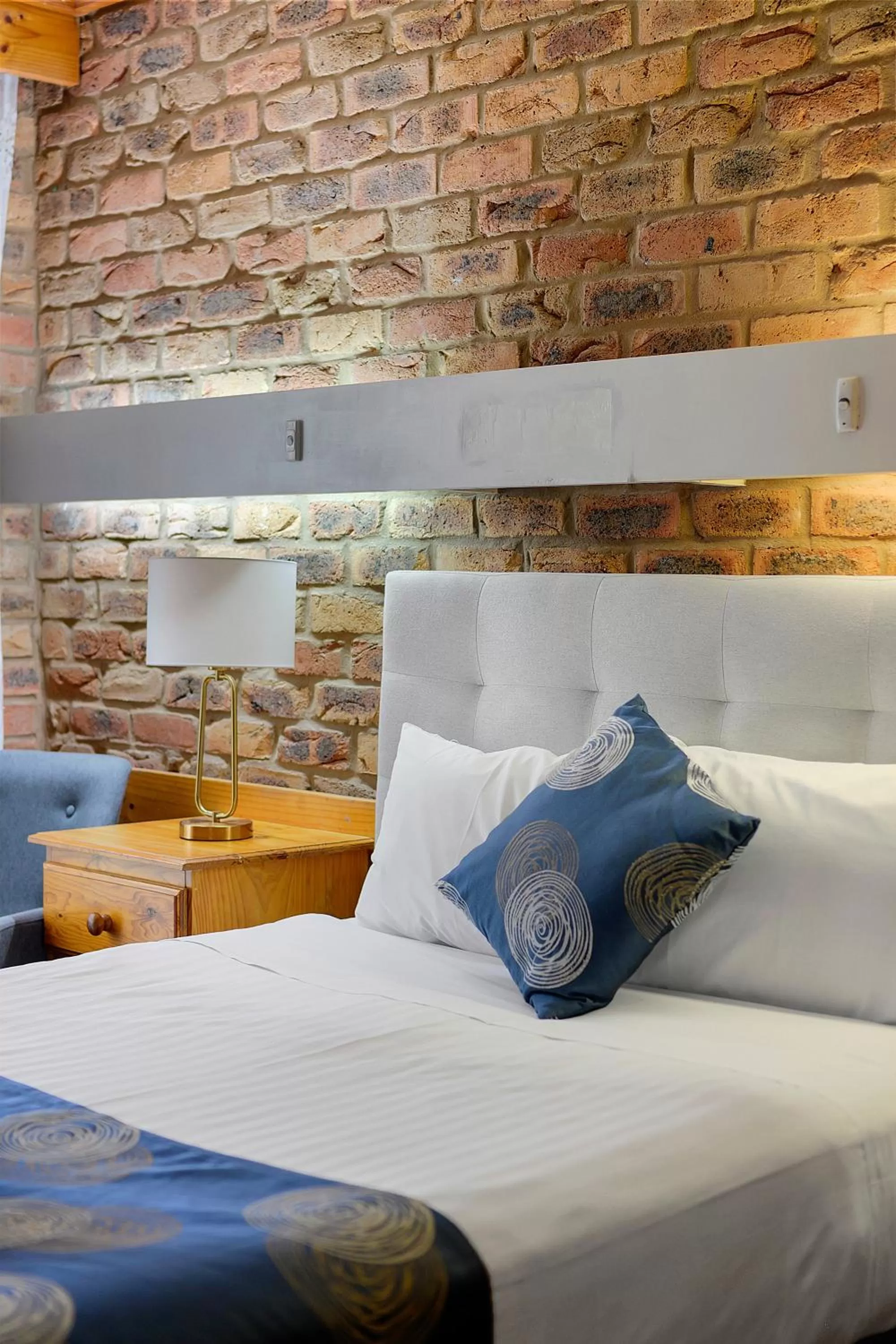 Bed in The Settlement Historic Hotel