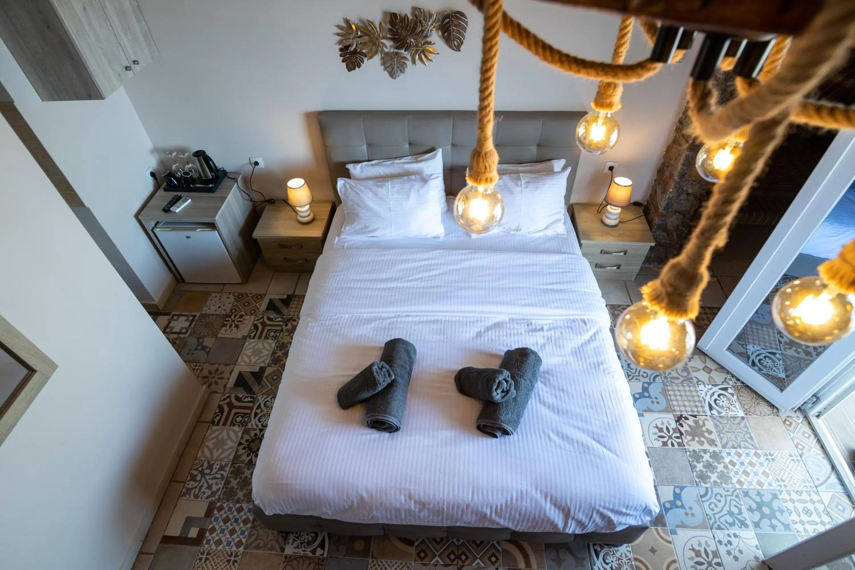 Bed in Votsalakia Hotel & Luxury Apartments