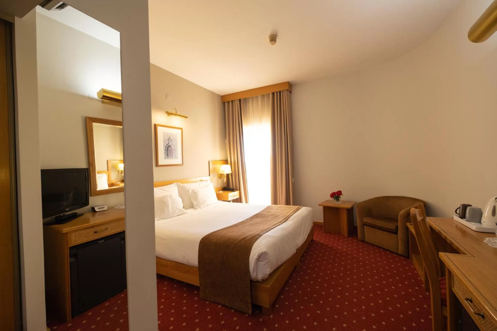 Coffee/tea facilities, Bed in Hotel Rainha D. Amélia, Arts & Leisure