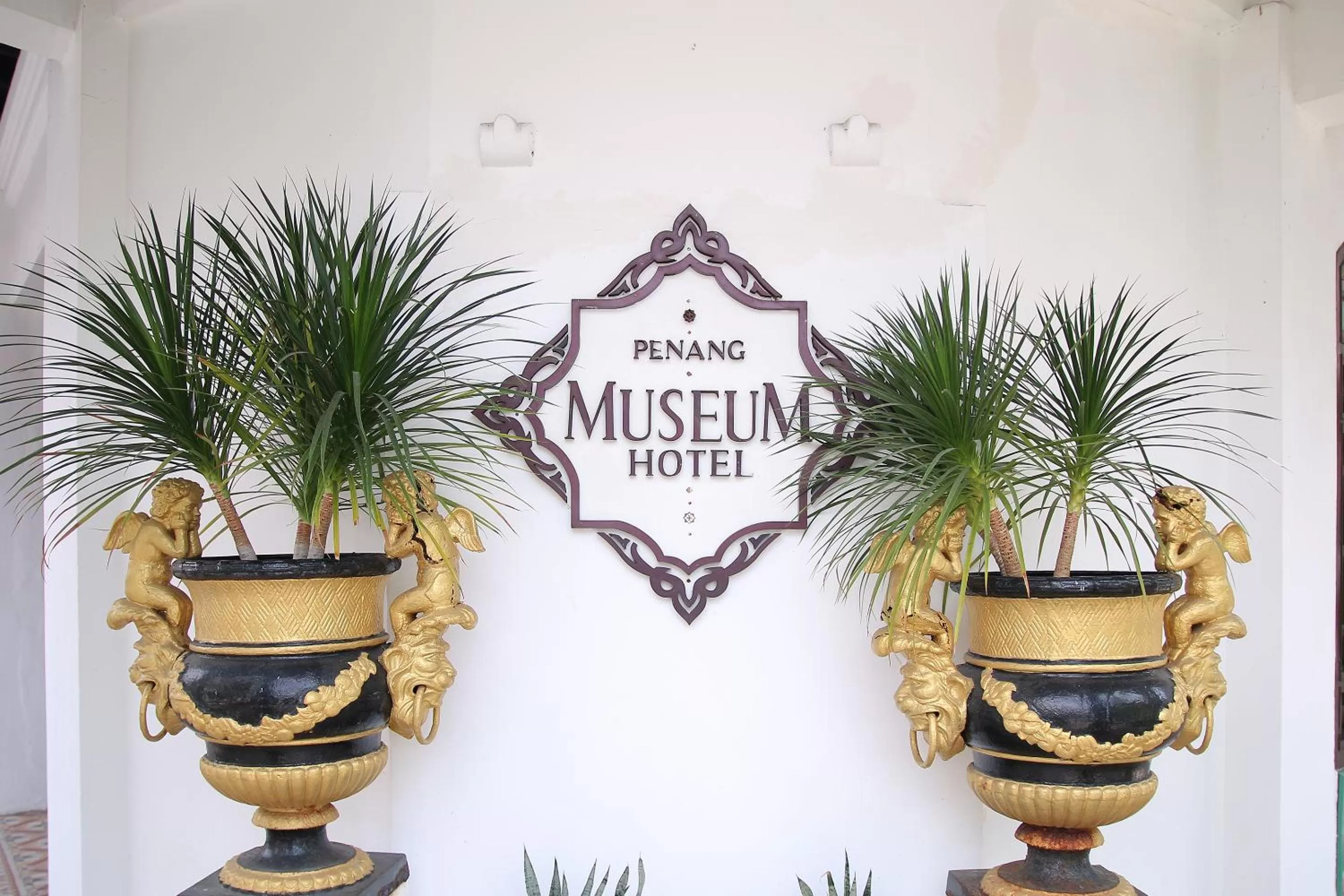 Property logo or sign in Museum Hotel