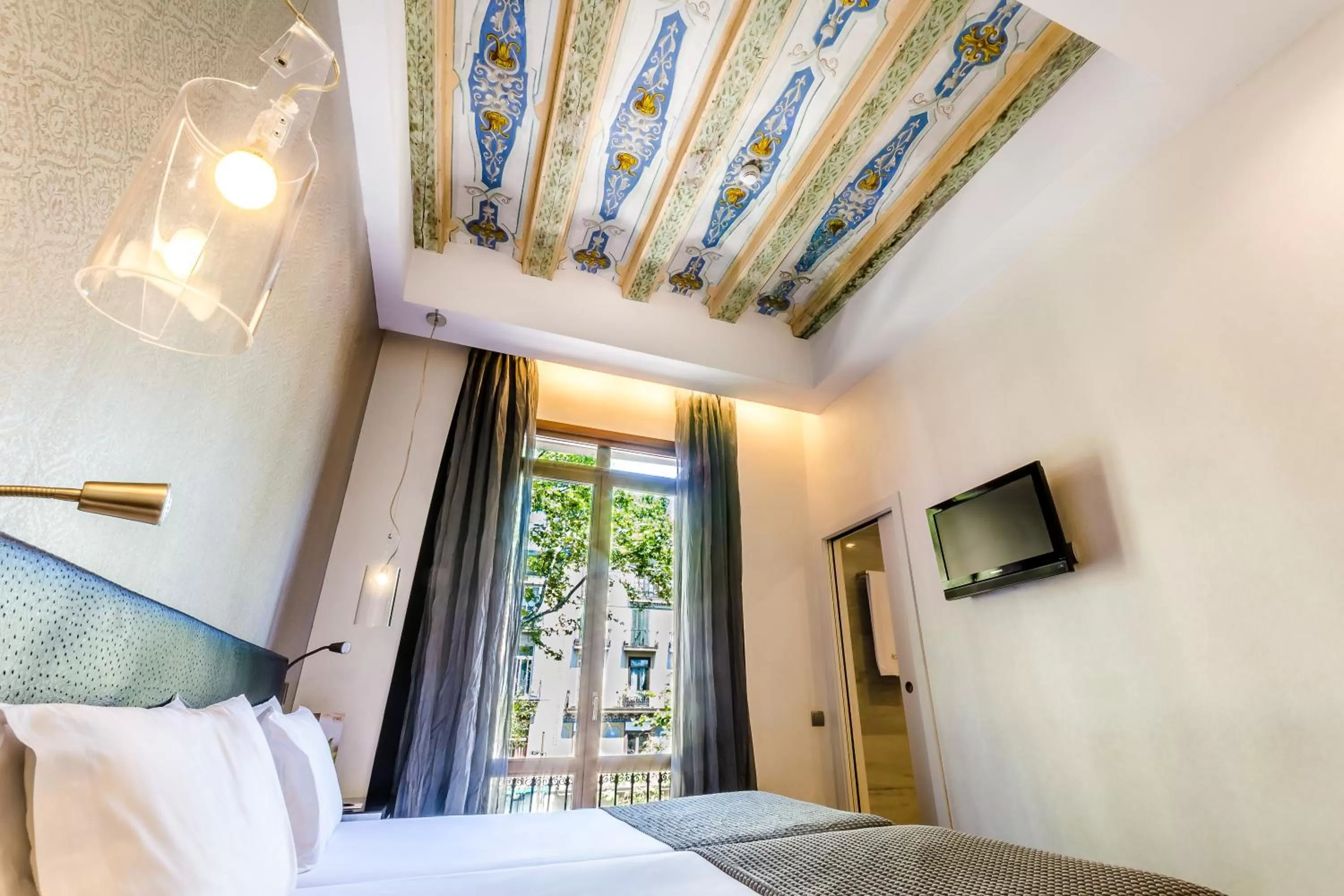 Bed in Exe Ramblas Boquería