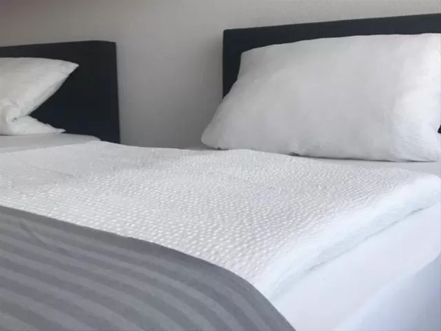 Bed in Gästehaus beim Prinz