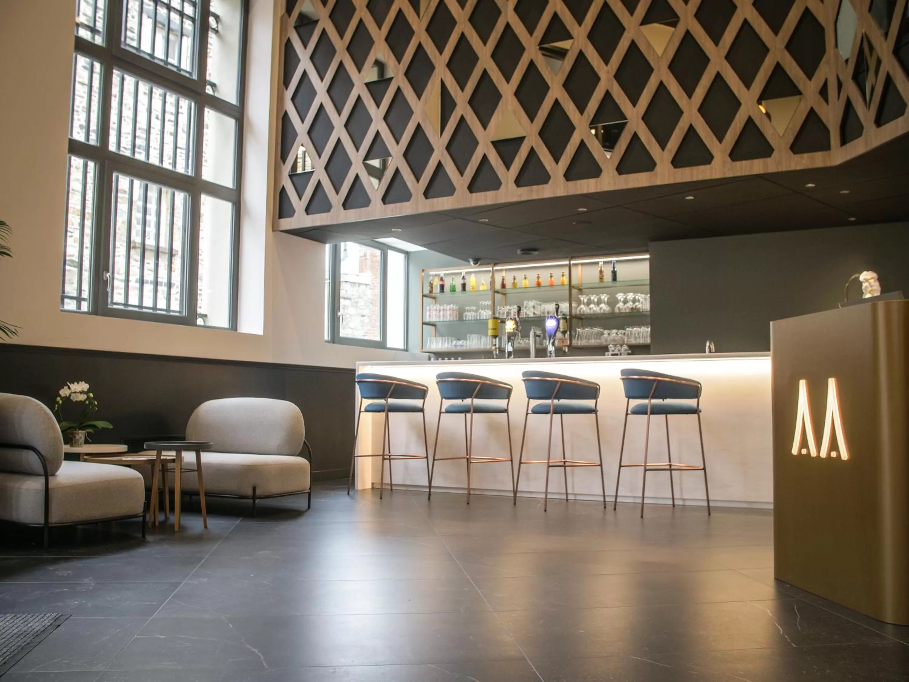 Lounge or bar in Le Magic Hôtel & Spa