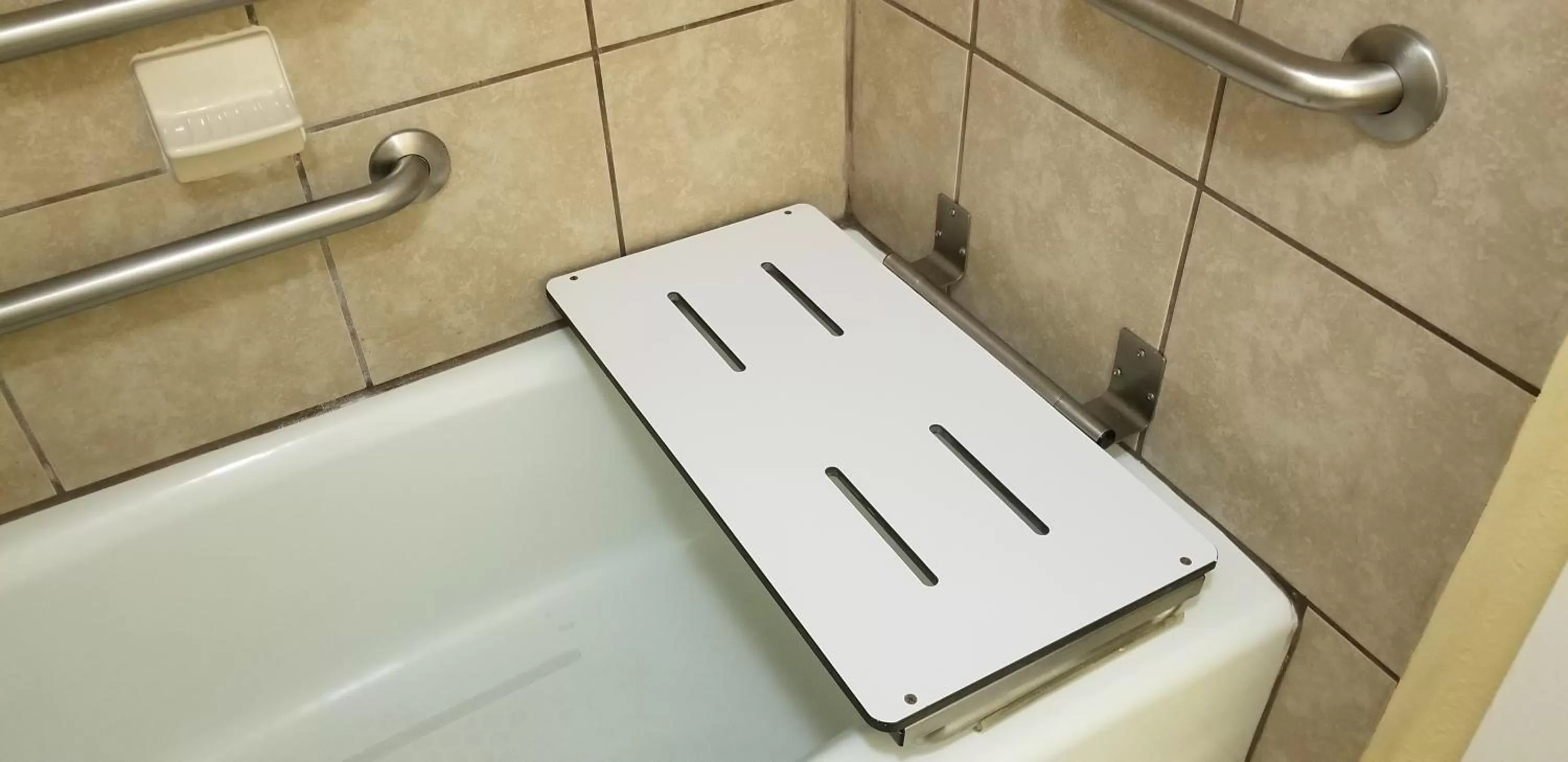 Bathroom in Days Inn by Wyndham Cocoa Cruiseport West At I-95/524