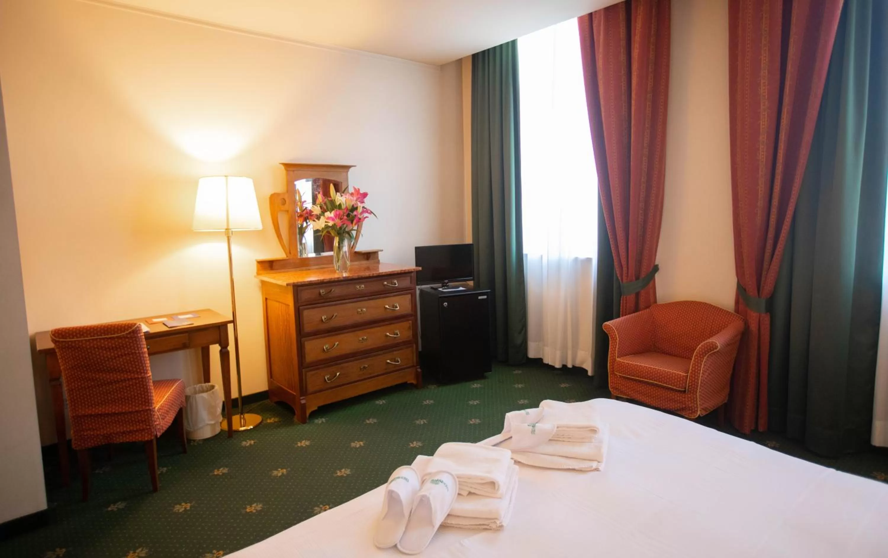 Bed in Hotel Candiani