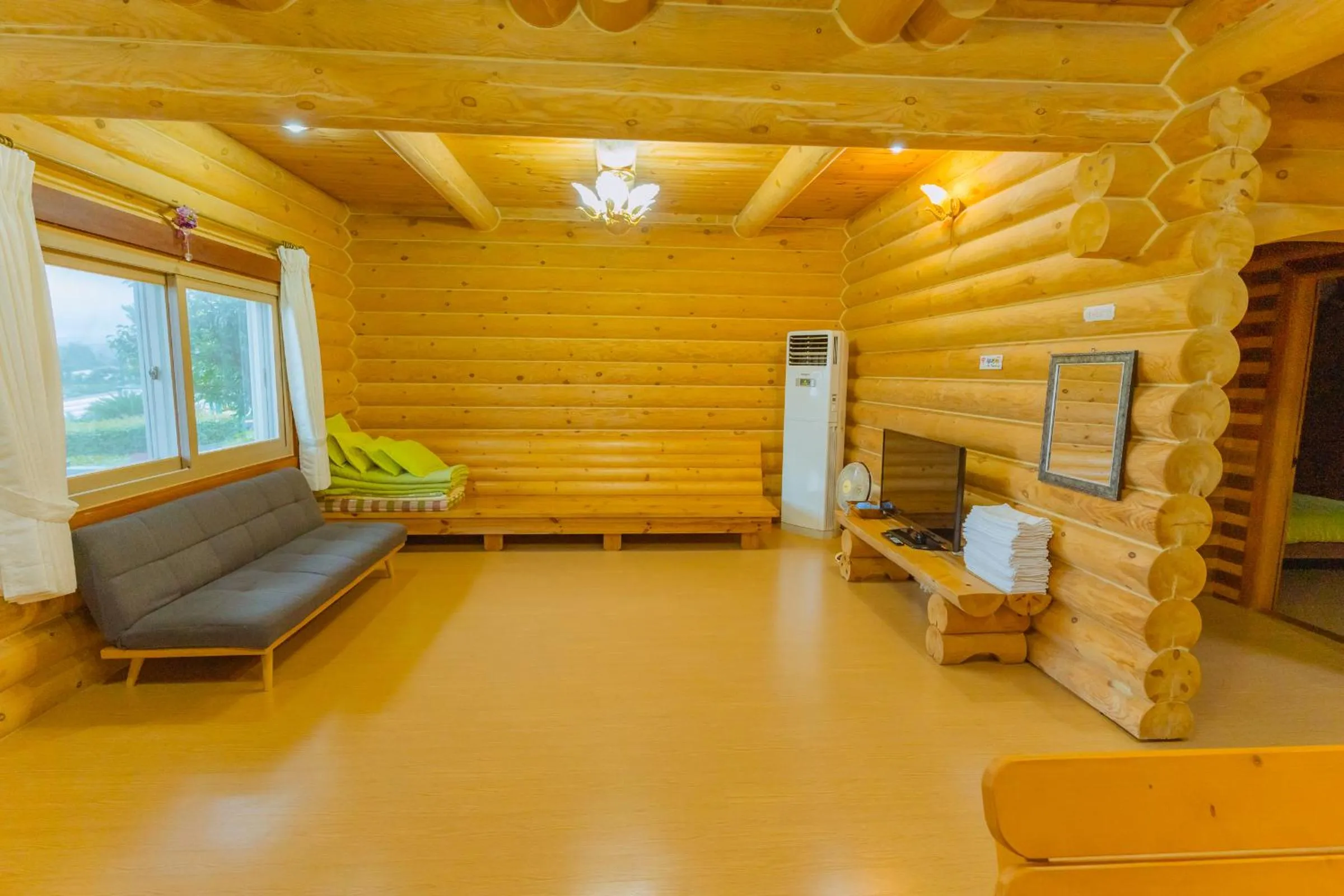 Living room in Jungmun Log Pension & Resort