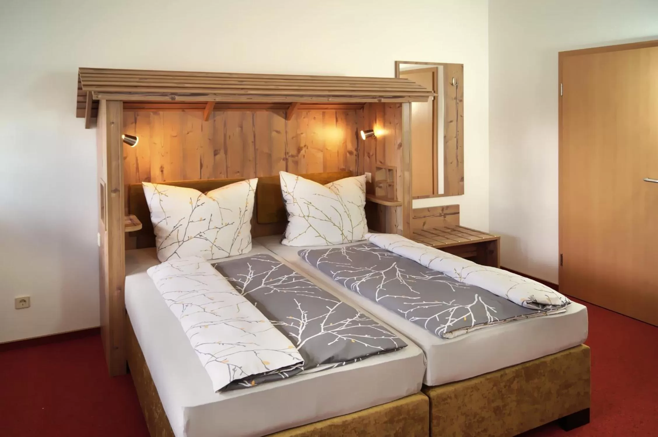 Bed in Erzgebirgshotel Misnia Bärenfels