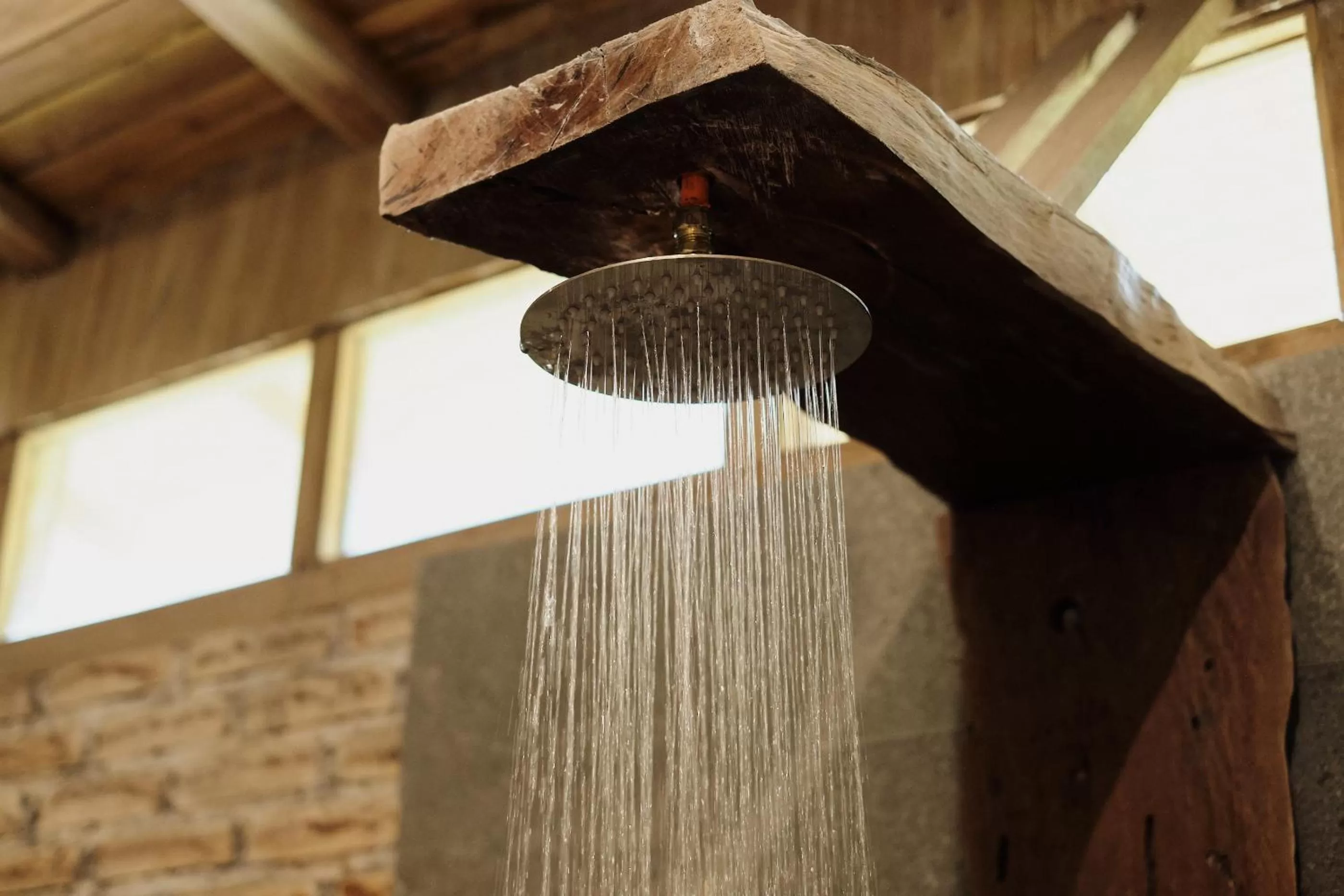 Shower in Joglo Organik Guesthouse