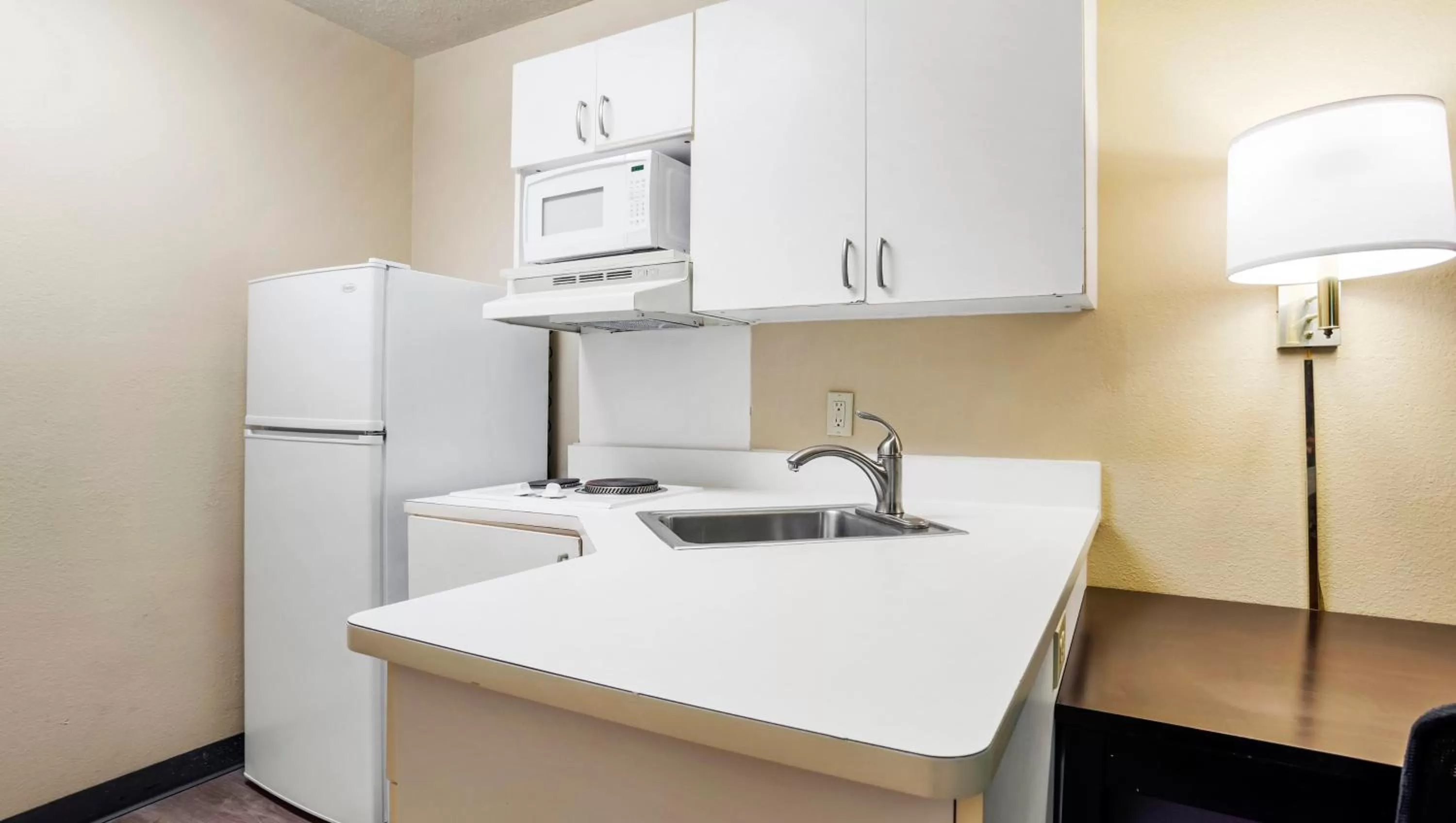 Kitchen or kitchenette in Home 1 Suites Extended Stay