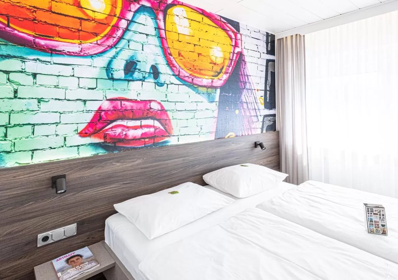 Decorative detail, Bed in ART-Hotel Braun