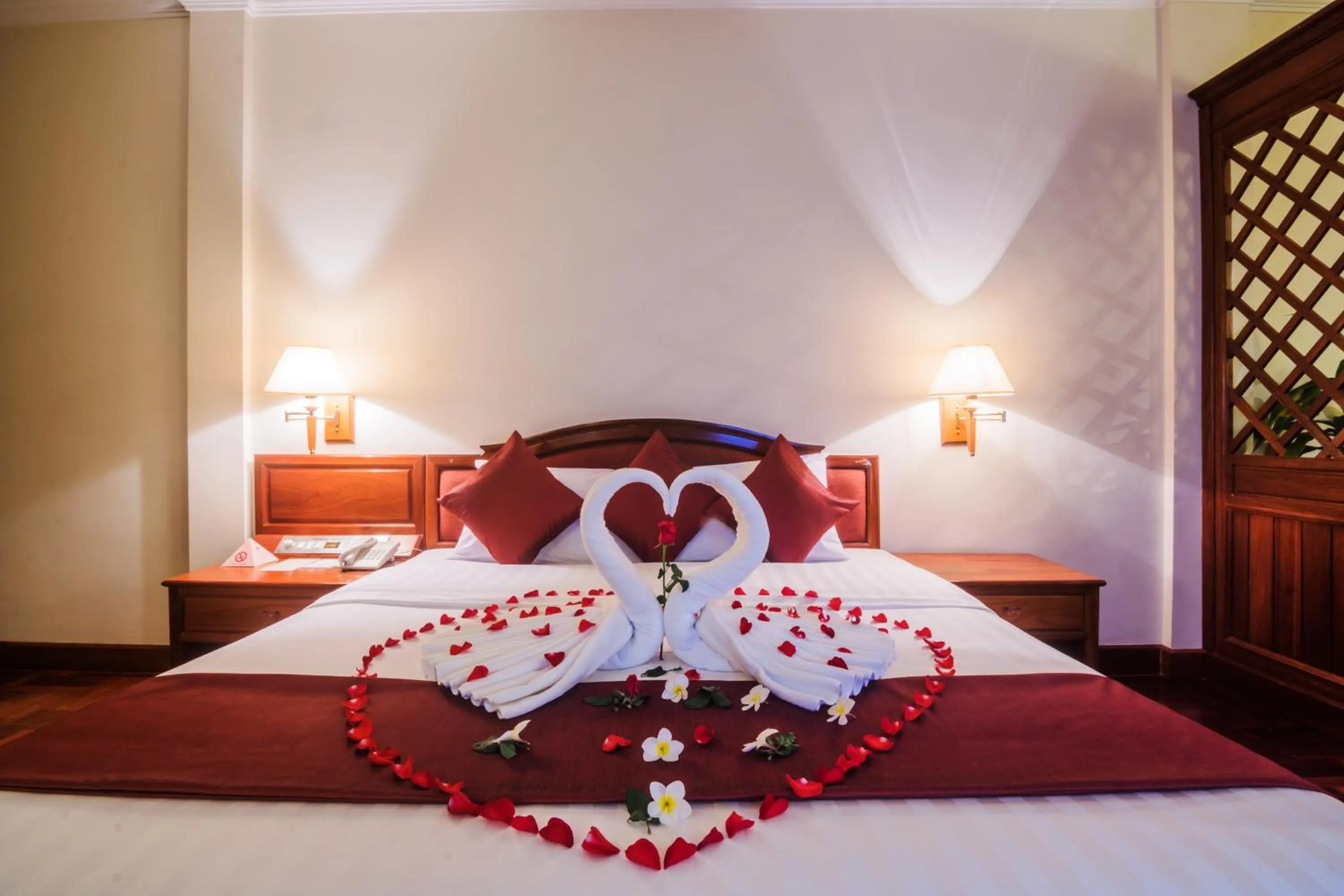 Bed in Khemara Angkor Hotel & Spa